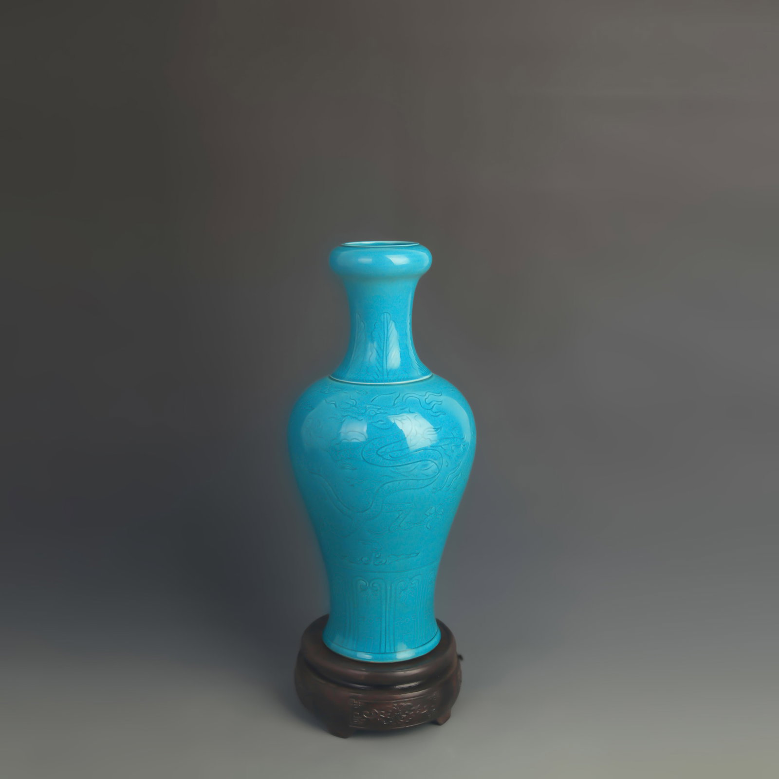 PEACOCK BLUE-GLAZED GUANYIN STYLE PORCELAIN VASE: Ming Dynasty Style Hong Zhi Period; High: 11.0 inch; Diameter: 5.20 inch; Woodbase for picture and display only