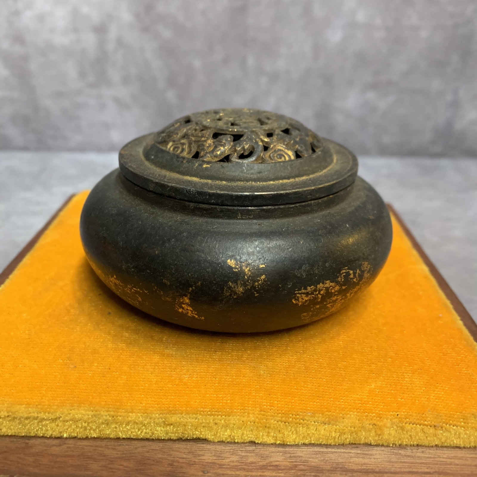 A FINE SMALL ROUND BRONZE INCENSE BURNER: Modern; High: 2.1 inch; Diameter: 3.9 inch; Woodbase for picture and display only