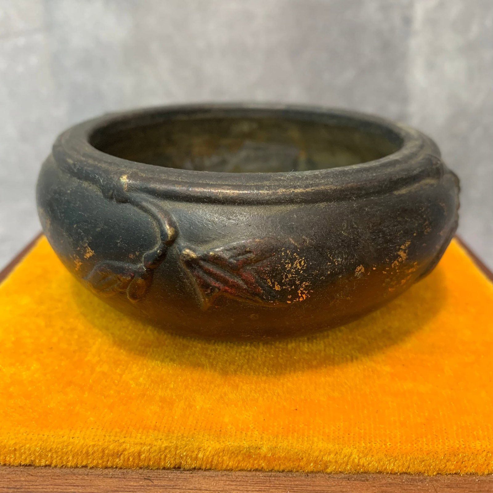 A FINELY CARVED ROUND BRONZE CENSER: Qing Dynasty; High: 1.7 inch; Diameter: 4.3 inch; Woodbase for picture and display only