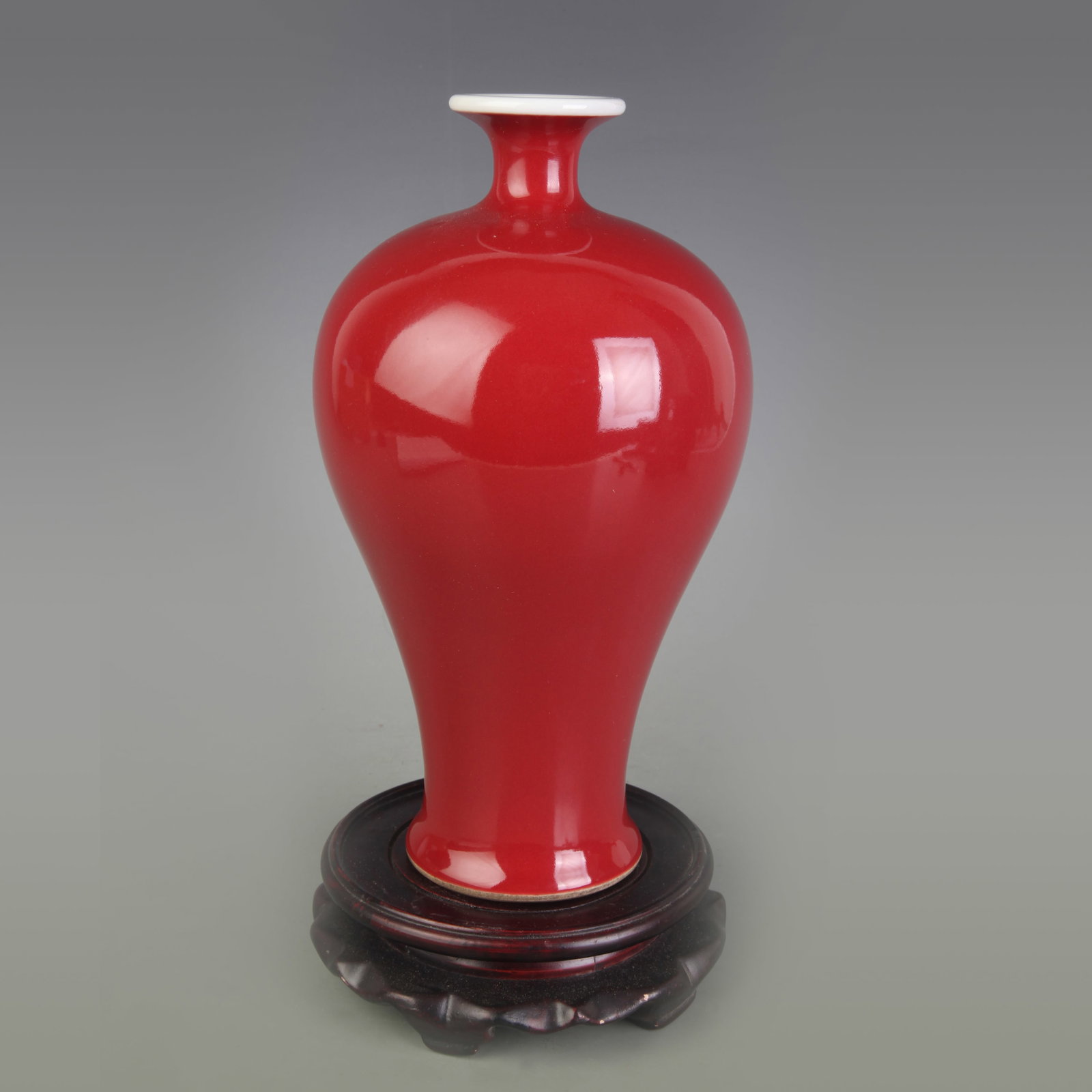 RED COLOR GLAZE MEIPING STYLE PORCELAIN VASE: Qing Dynasty Qian Long Period; Diameter: 2.9 inch; High: 9.1 inch; Woodbase for picture and display only