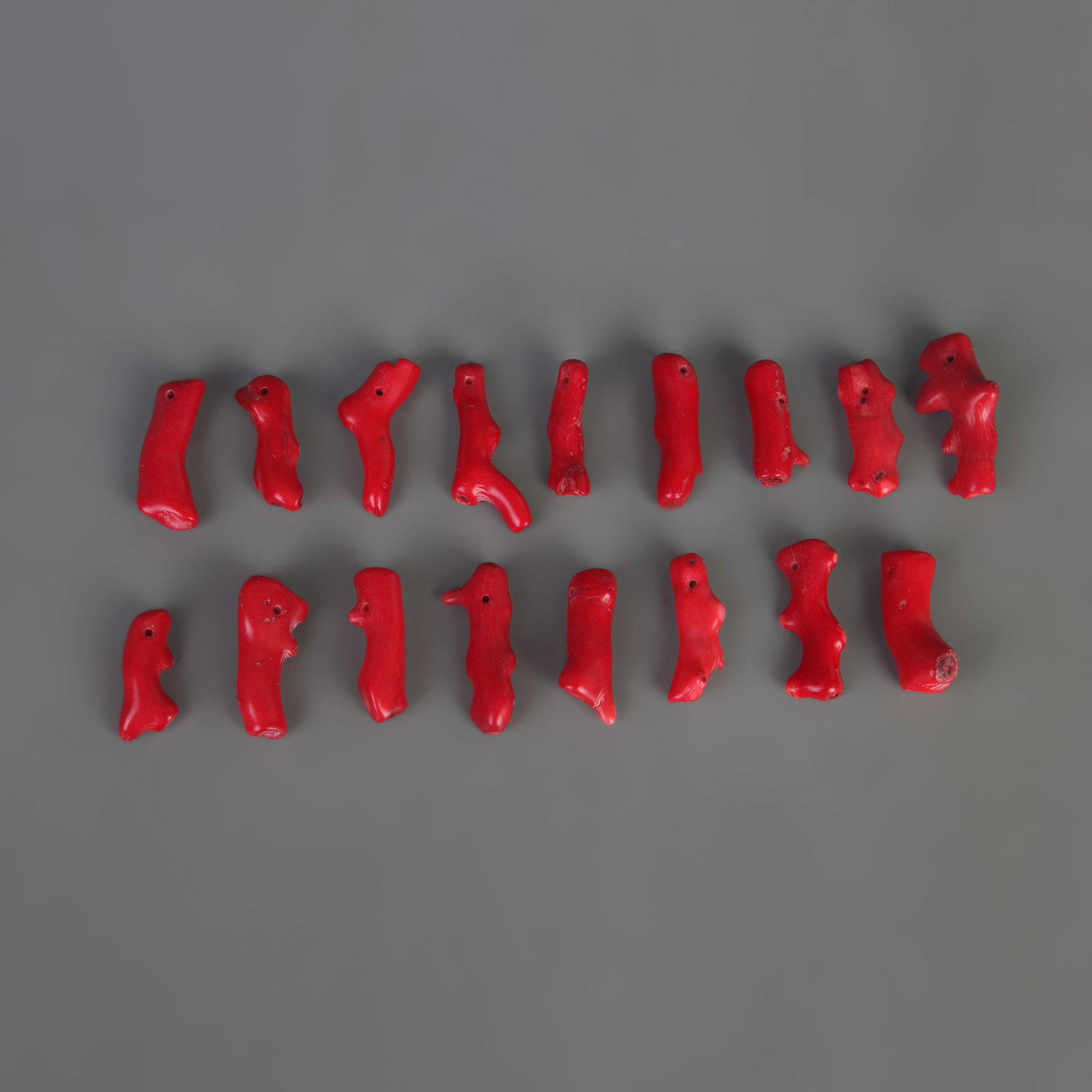 A GROUP OF CORAL PENDANTS: Modern; Long: 1.0 inch to 2.5 inch; Woodbase for picture and display only
