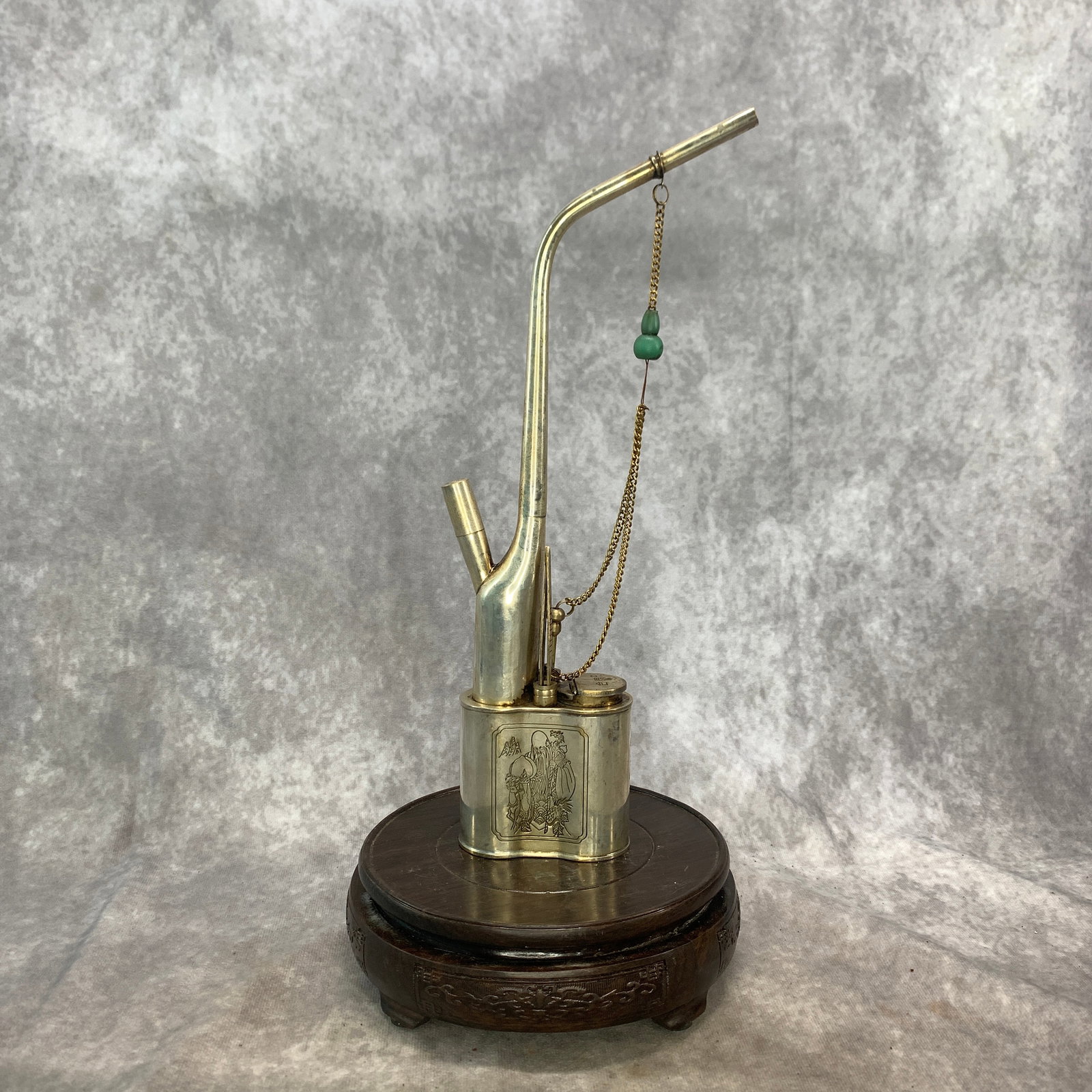 A FINE WHITE BRONZE WATER SMOKING PIPE (1 of 5)