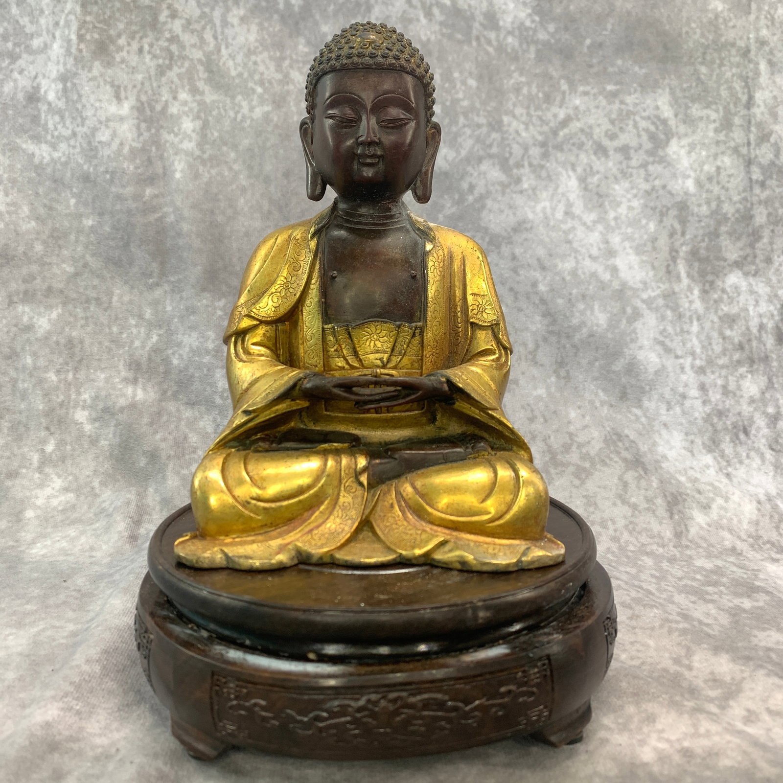 GILT-BRONZE AMITABHA BUDDHA: 20th Century; Long: 4.9 inch; Width:3.2 inch; Heigh: 7.3 inch; Woodbase for picture and display only