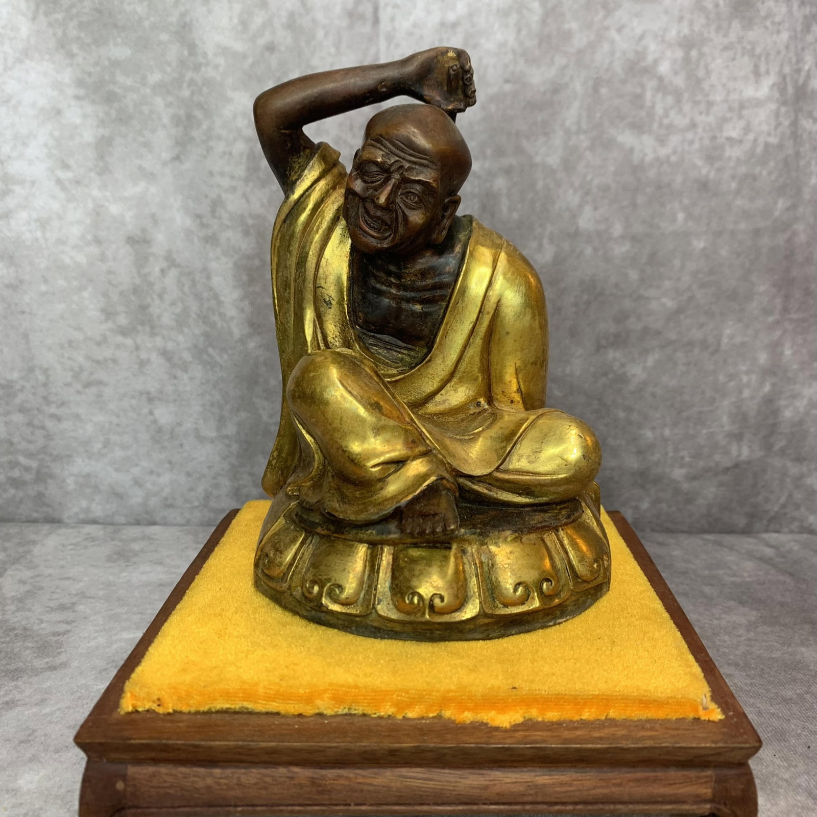 A FINE BRONZE MADE LU HAN FIGURE: 20th Century; High: 6.3 inch; Width: 4.5 inch; Long: 3.5 inch; Woodbase for picture and display only