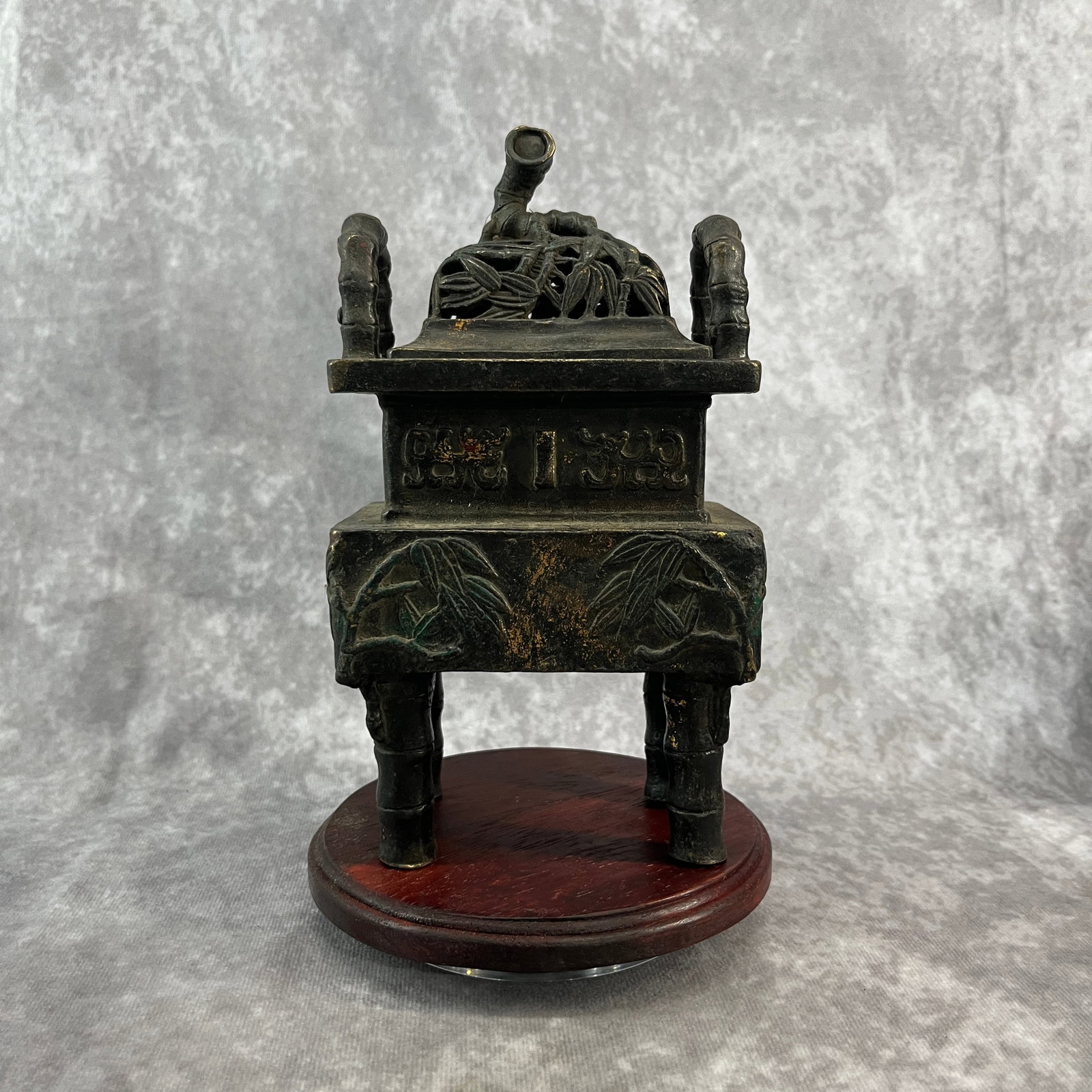 A FINE BRONZE "BAMBOO" TRIPOD CENSER: Qing Dynasty; Long: 4.4 inch; Width:3.2 inch; Heigh: 7.7 inch; Woodbase for picture and display only