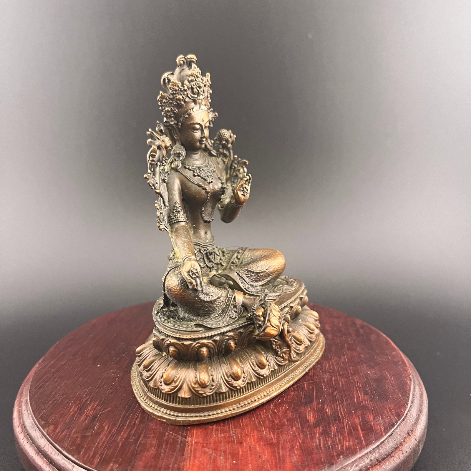 A SMALL BRONZE GREEN TARA STATUE - 2