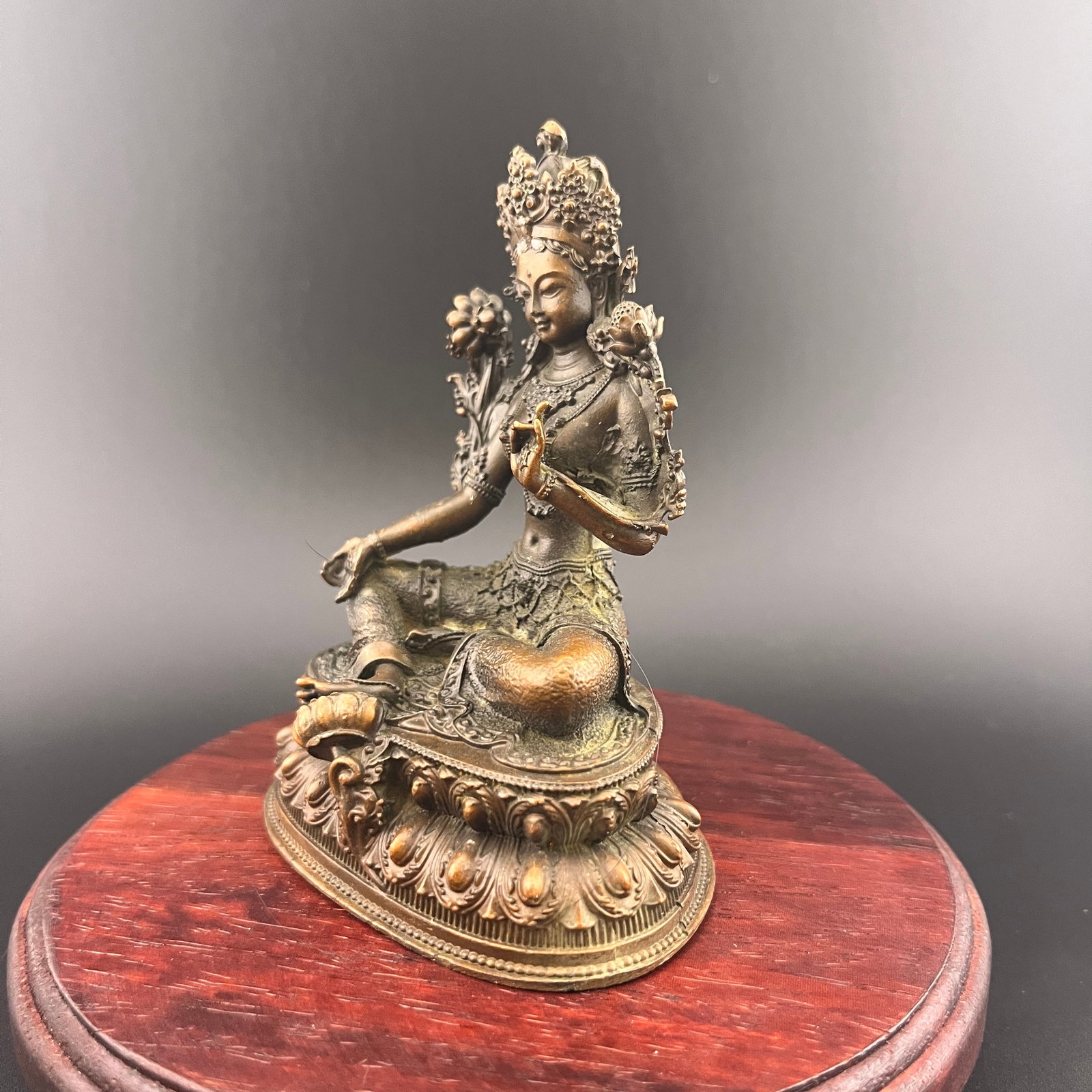 A SMALL BRONZE GREEN TARA STATUE - 3