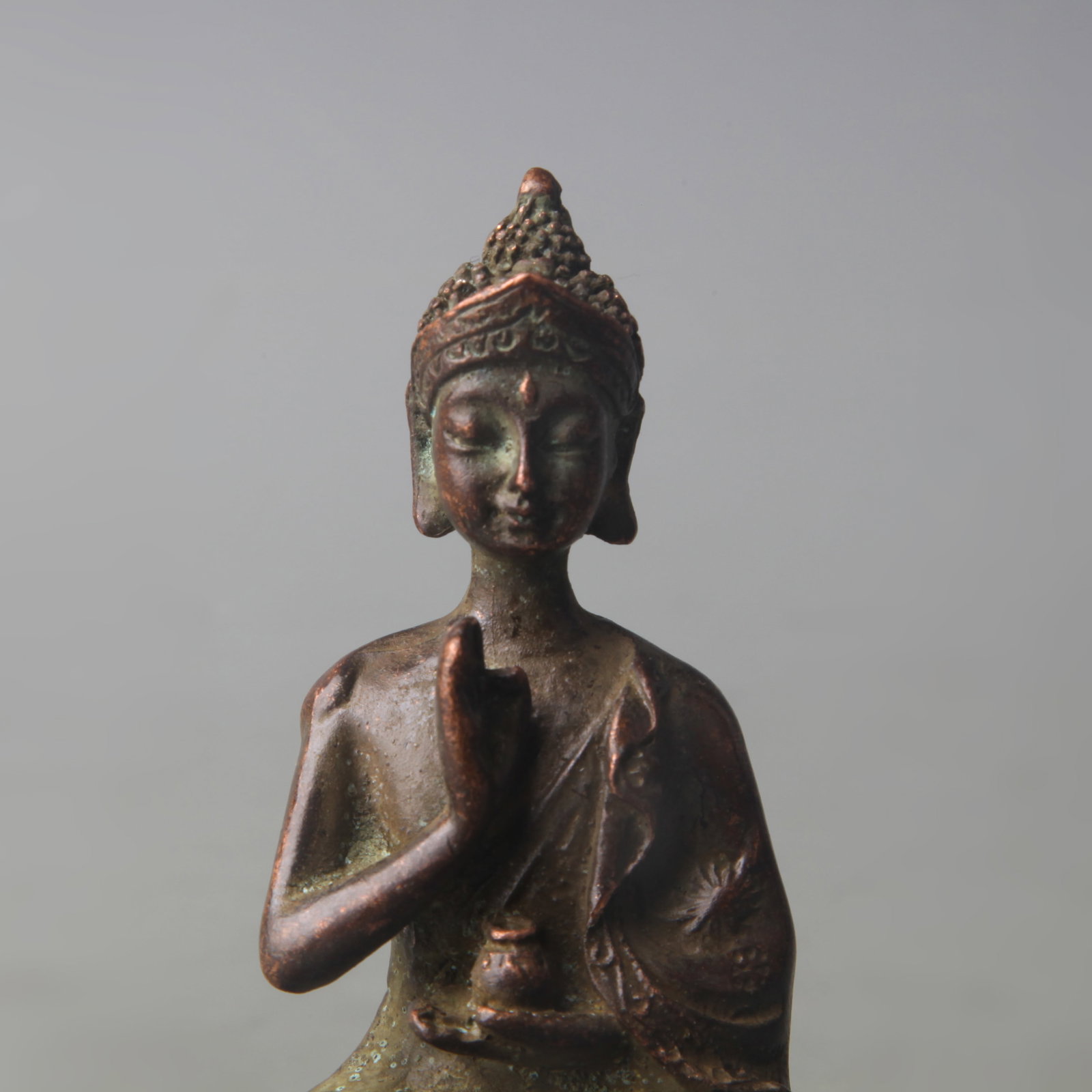 A SMALL BRONZE BUDDHA FIGURE - 2