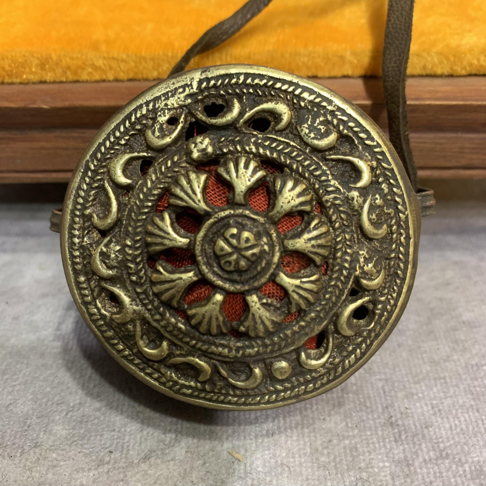 A FINE TIBETAN BUDDHIST GAWU PENDANT: Modern, High: 1.0 inch; Diameter: 2.3 inch ; Woodbase for picture and display only