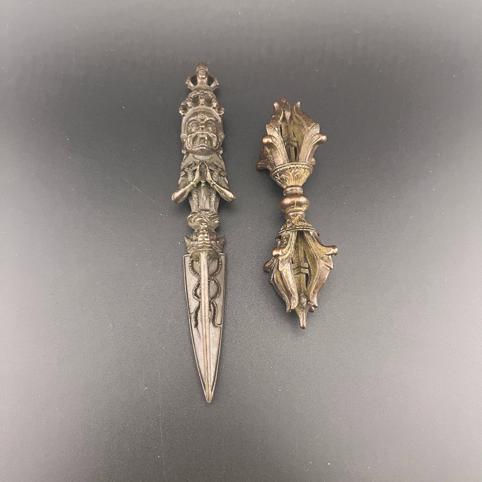 GROUP OF TIBETAN VAJRA AND PHURBA RITUAL IMPLEMENTS: Modern; Long: 5.5 inch; Diameter: 0.95 inch; Heigh: 3.74 inch; Diameter: 1.3 inch; Woodbase for picture and display only
