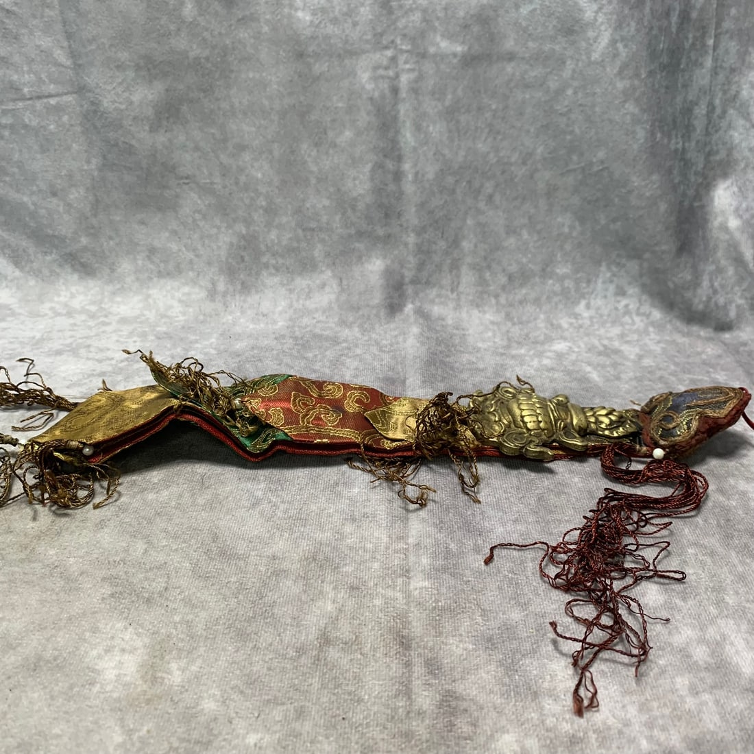 TIBETAN BUDDHIST BRONZE EMBROIDERED RITUAL OBJECT: Republic Period; Long: 14 inch; Width: 2.8 inch; High: 0.5 inch; Woodbase for picture and display only