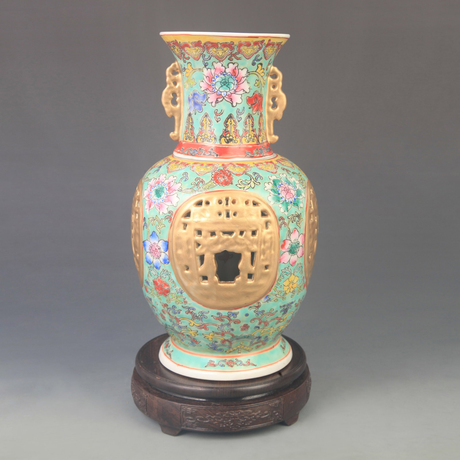 A FINE FAMILLE ROSE GLAZED INNER REVOLVING PORCELAIN VASE: Qing Dynasty Qian Long Period;High: 11.6 inch; Diameter: 7.00 inch; Woodbase for picture and display only