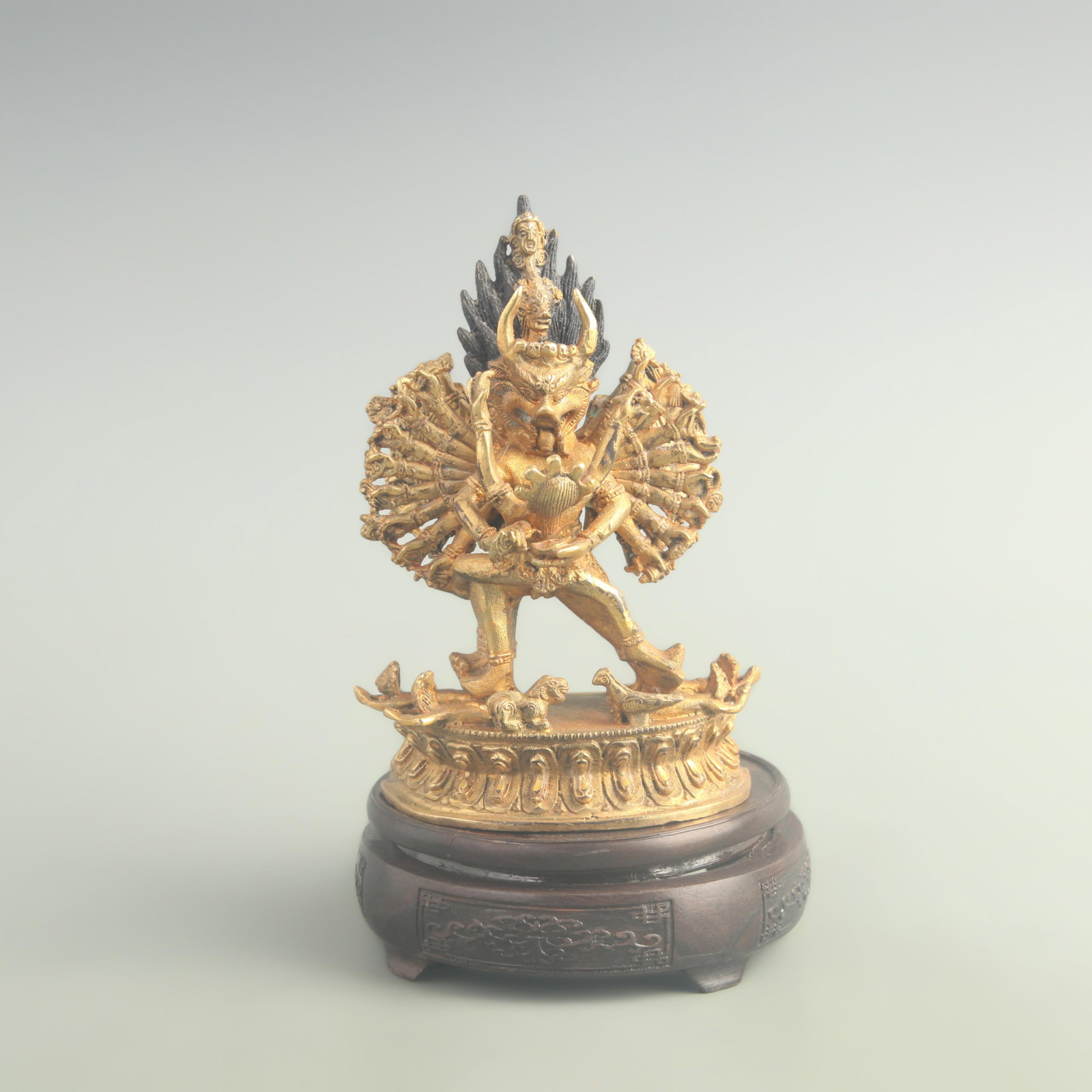 A FINE BRONZE GILT NANDIKESVARA BUDDHA STATUE: 19th Century; High: 7.00 inch; Width: 2.10 inch; Long: 4.70 inch; Woodbase for picture and display only