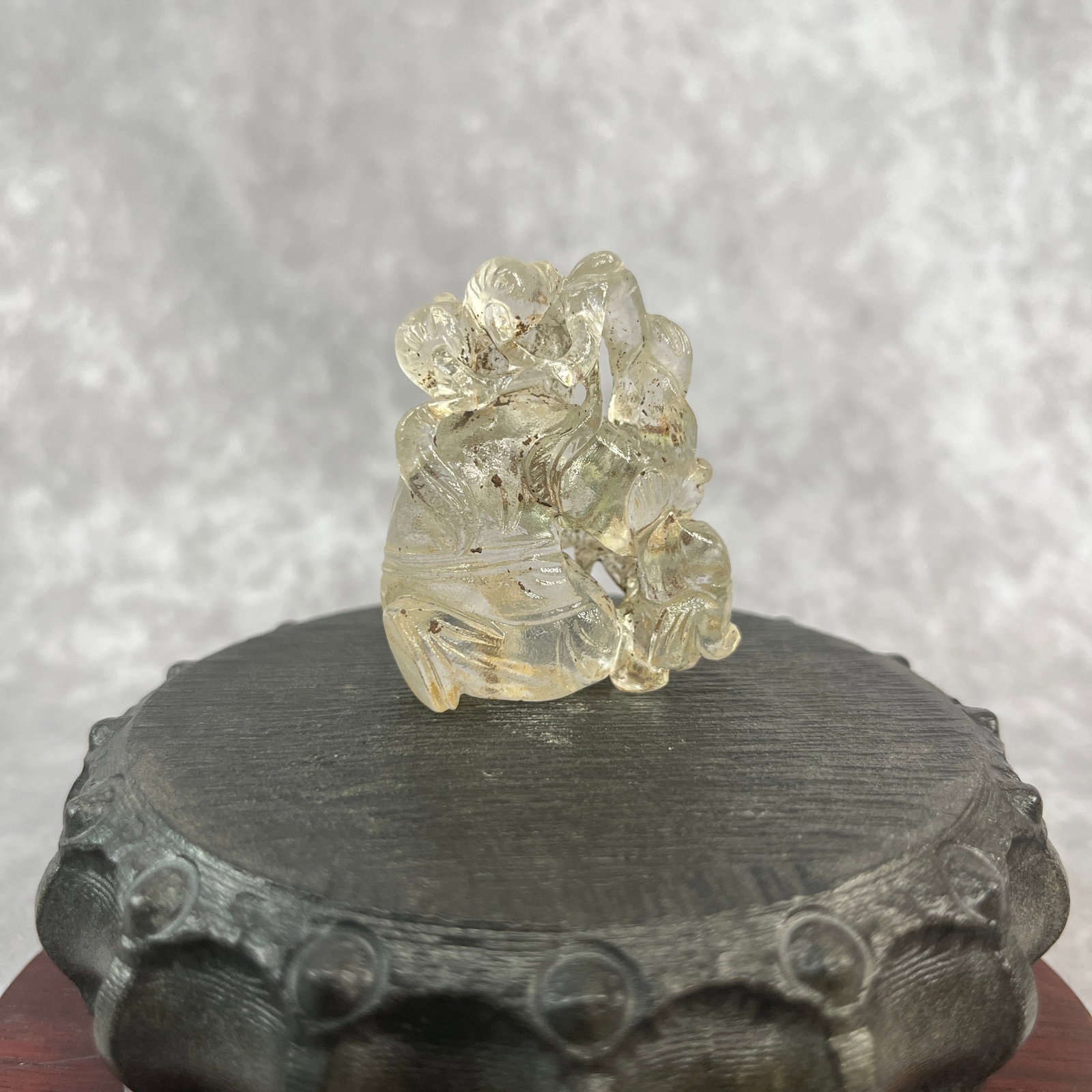 A FINE CLEAR QUARTZ BOY PLAYING FIGURE - 3