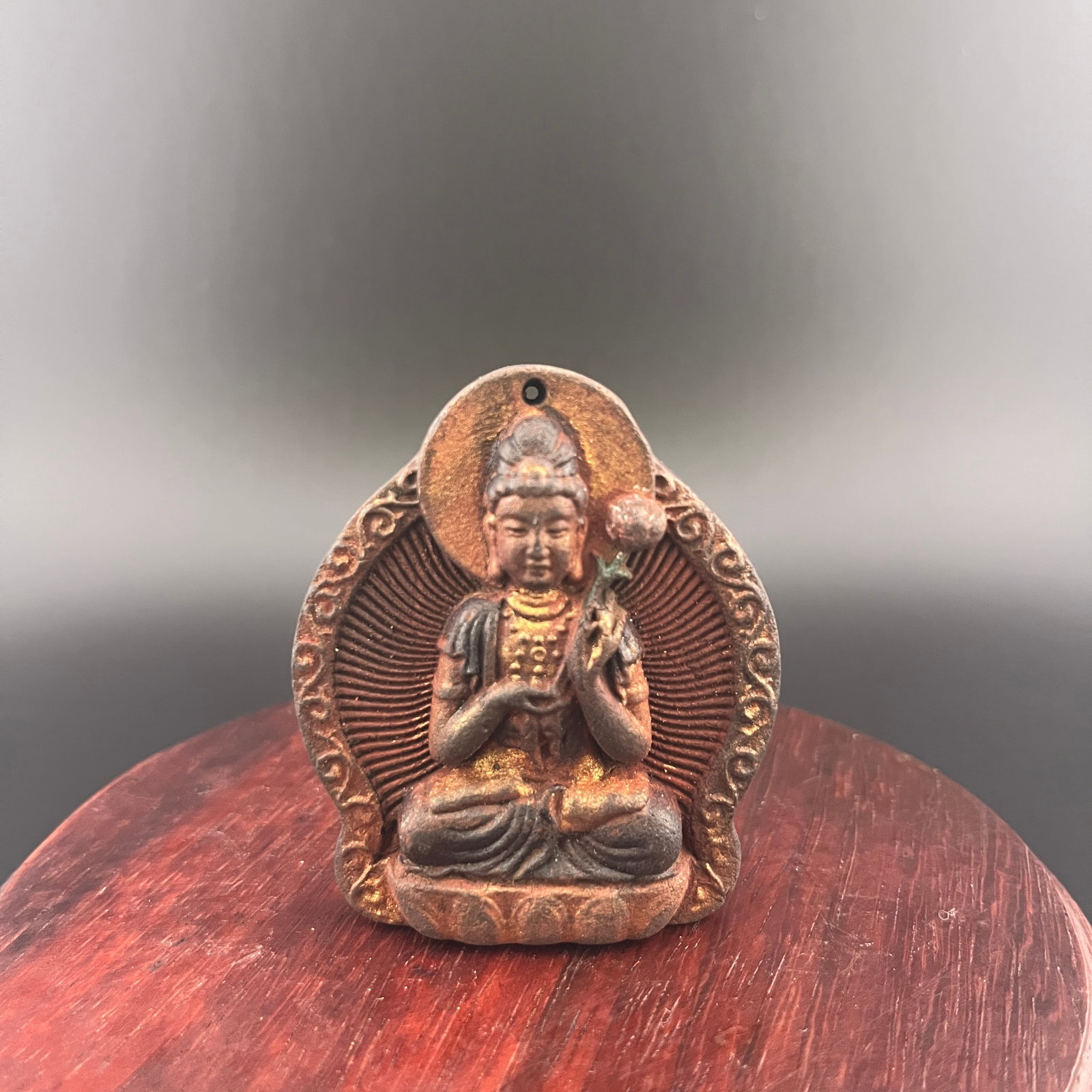 A SMALL CHINESE HERBAL MEDICINE MADE BUDDHA STATUE: Modern; Width:2.05 inch; Heigh: 2.5 inch; Woodbase for picture and display only