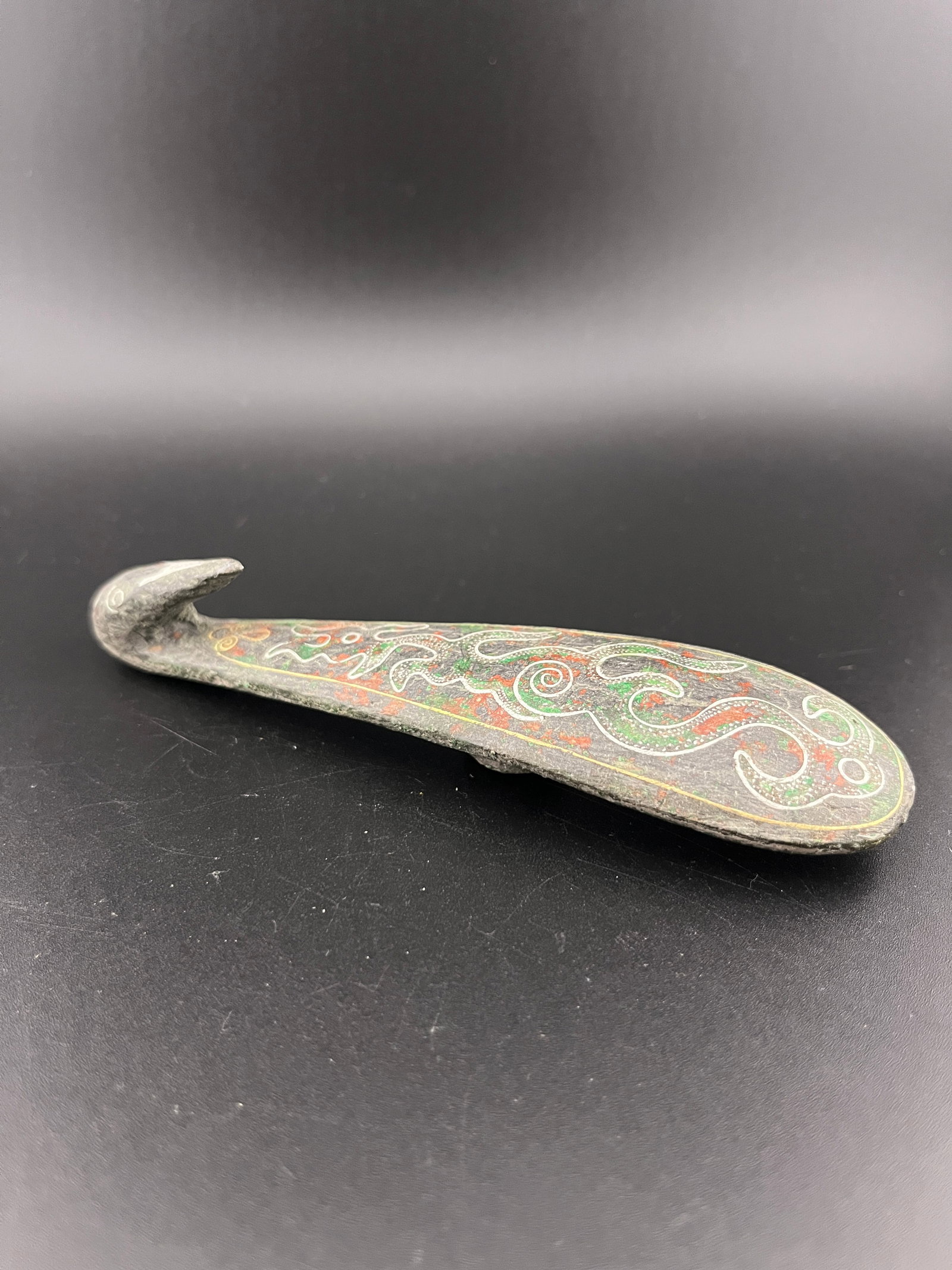 A FINE SILVER INLAYED BRONZE GARMENT HOOK (1 of 7)