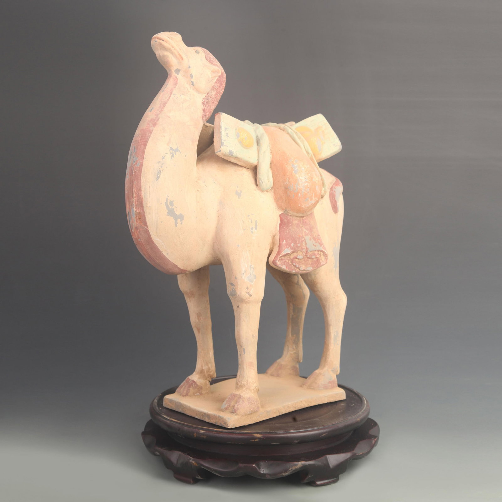 A FINE COLORED POTTERY CAMEL FIGURINE: Han Dynasty Style; High: 17.5 inch; Width: 12.5 inch; Woodbase for picture and display only