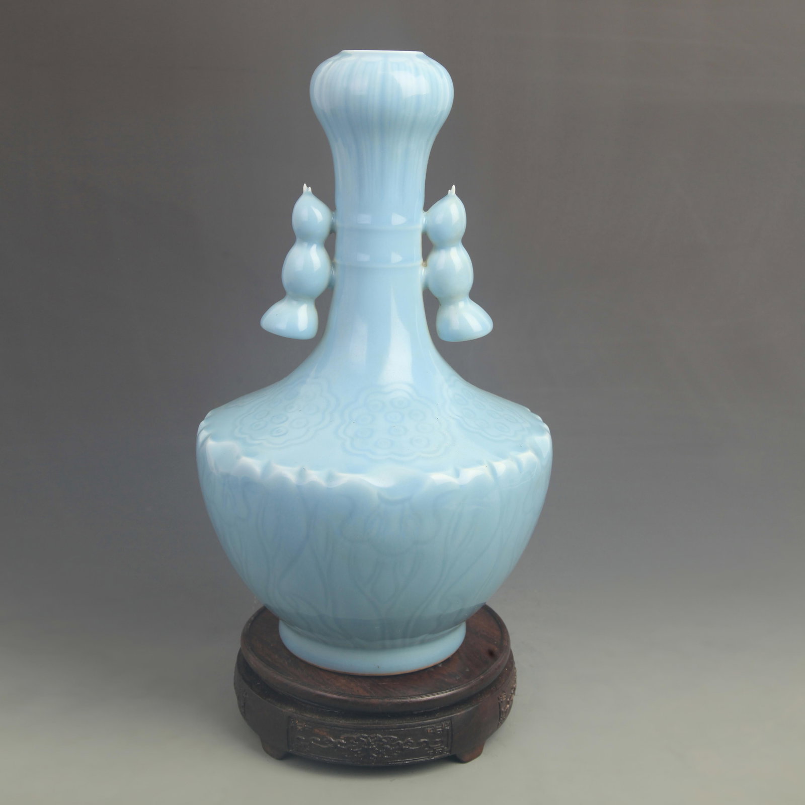 SKY BLUE GLAZED DOUBLE EARED GARLIC HEAD STYLE PORCELAIN VASE: Qing Dynasty Qian Long Period; High: 13.0 inch; Diameter: 7.80 inch; Woodbase for picture and display only