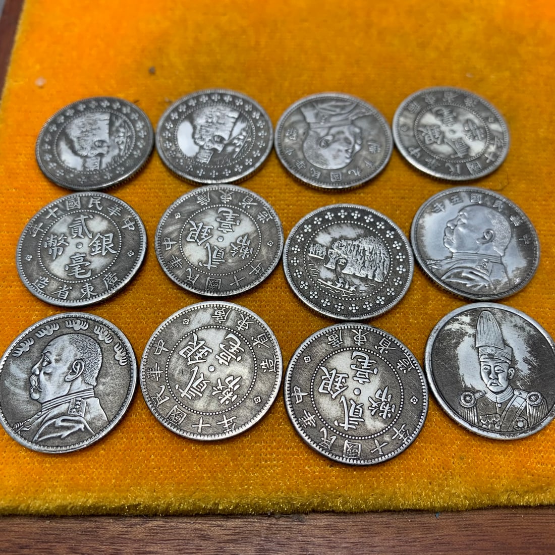 12 QING DYNASTY 20-WEN SILVER COINS: Qing Dynasty; Diameter: 0.9 inch; Woodbase for picture and display only