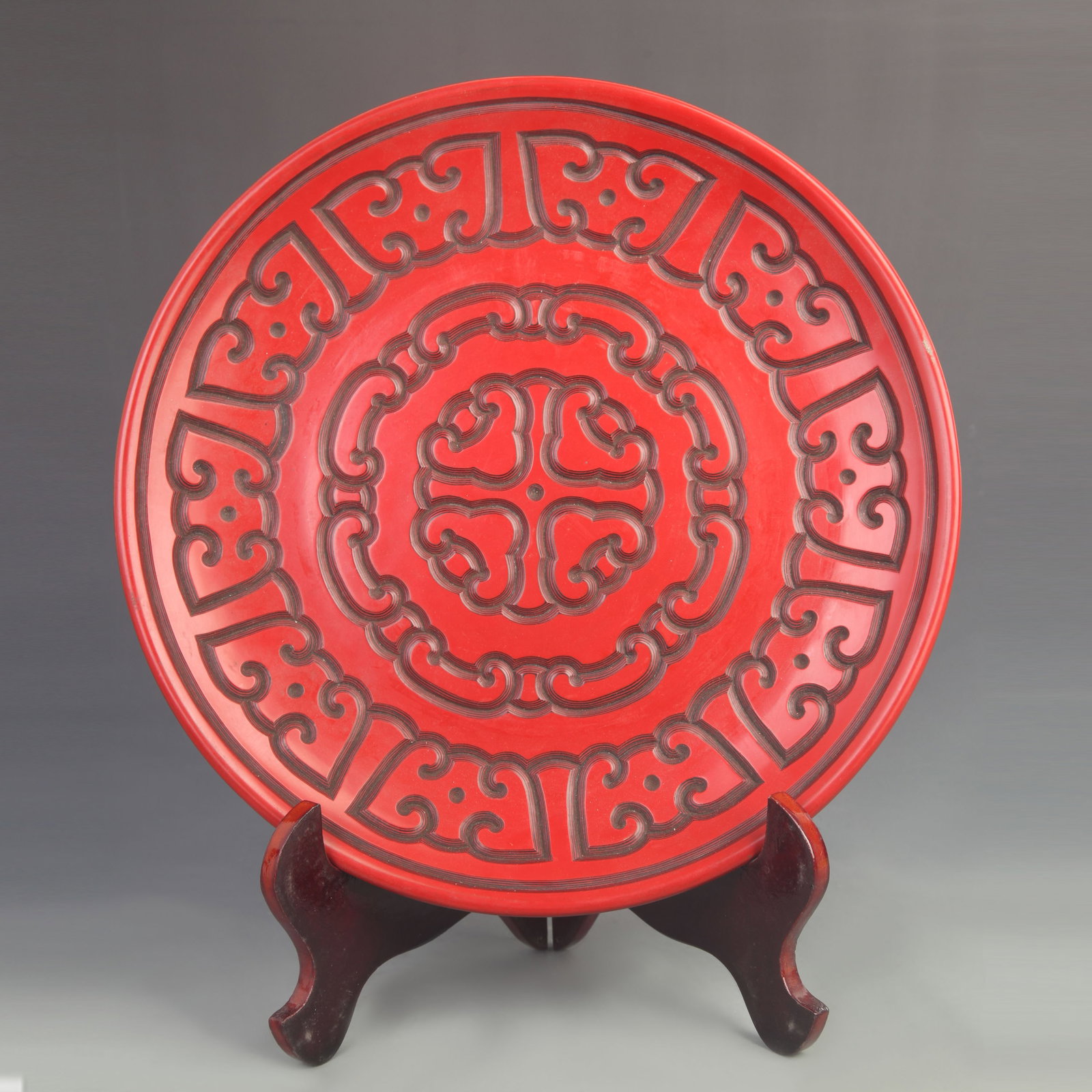 CARVED RED COLOR RUYI DESIGN WOODEN PLATE: Qing Dynasty; High: 1.50 inch; Diameter: 12.0 inch; Woodbase for picture and display only