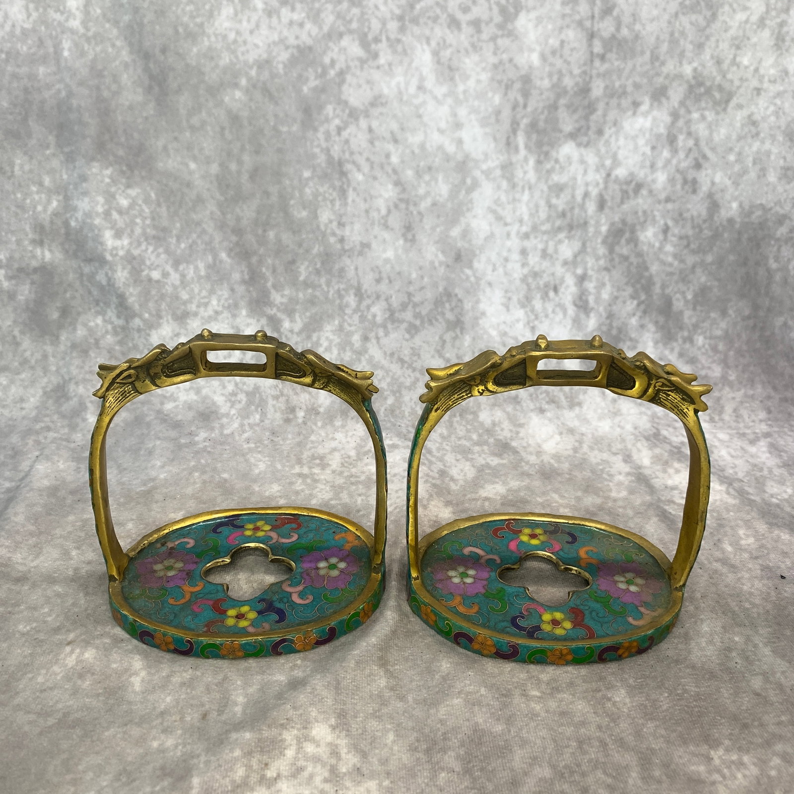 PAIR OF CLOISONNE ENAMEL IMPERIAL STYLE HORSE STIRRUPS: Qing Dynasty; Long: 5.2 inch; Width:4.1 inch; Heigh: 5.1 inch; Woodbase for picture and display only