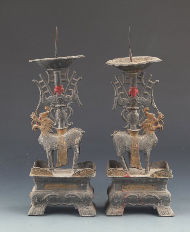 A PAIR OF TIN "KIRIN" CANDLESTICKS: Qing Dynasty, H: 10.4"