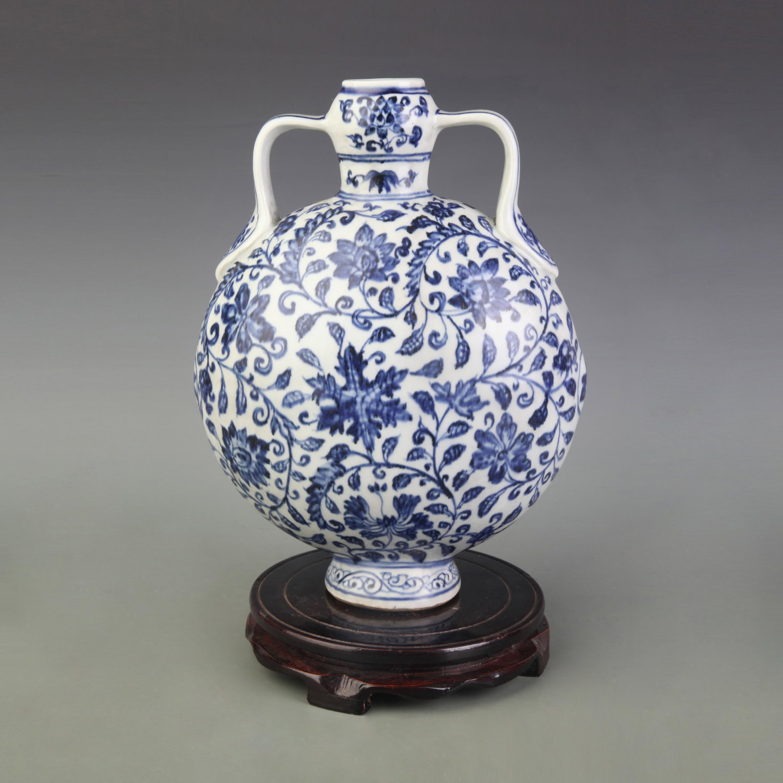 A BLUE AND WHITE MOON FLASK WITH FLORAL DECORATION (1 of 5)