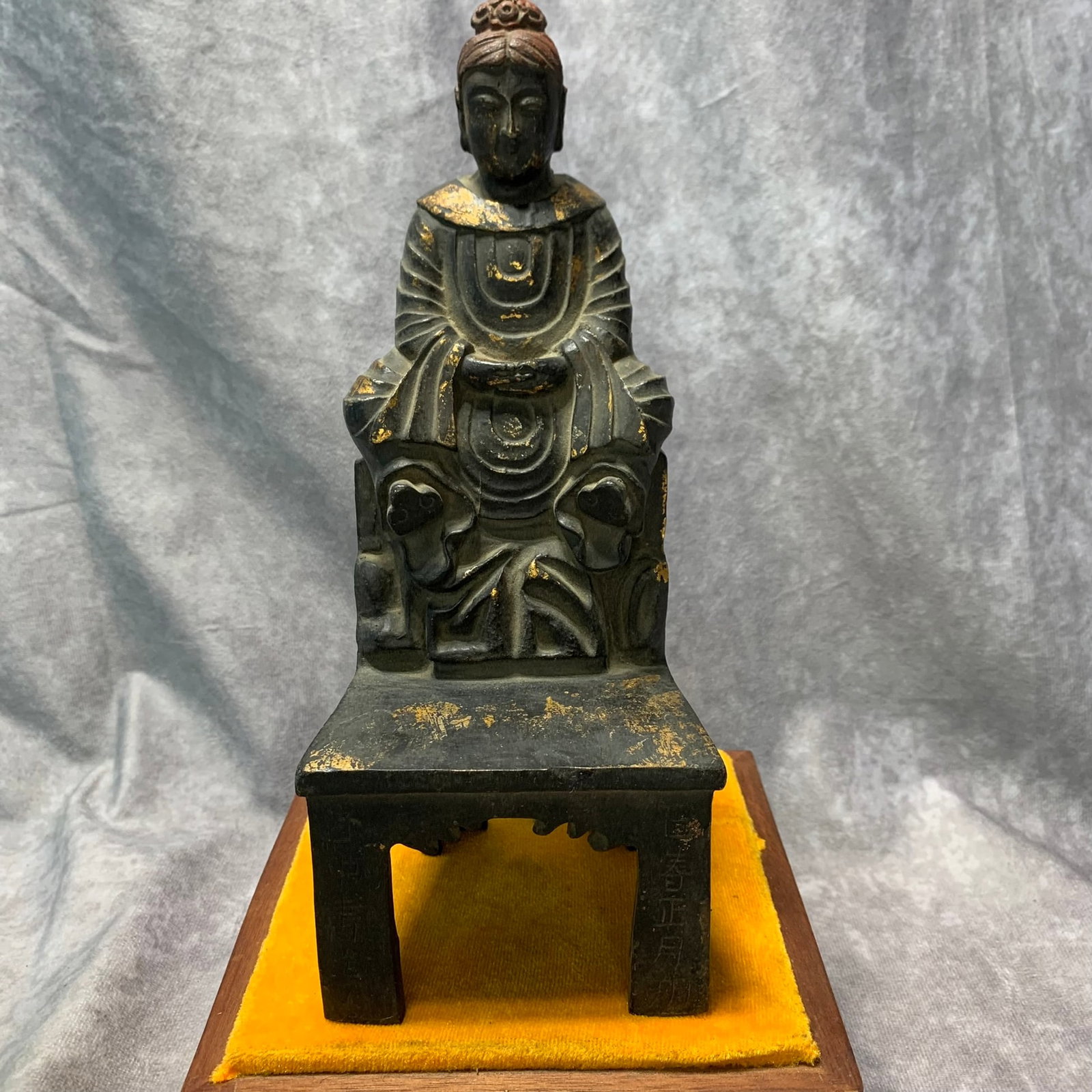 A GILT-BRONZE BUDDHA FIGURE WITH INSCRIPTION: Ming Dynasty Style; Long: 3.8 inch; H; 9.7 inch. Wooden base for picture and display only.