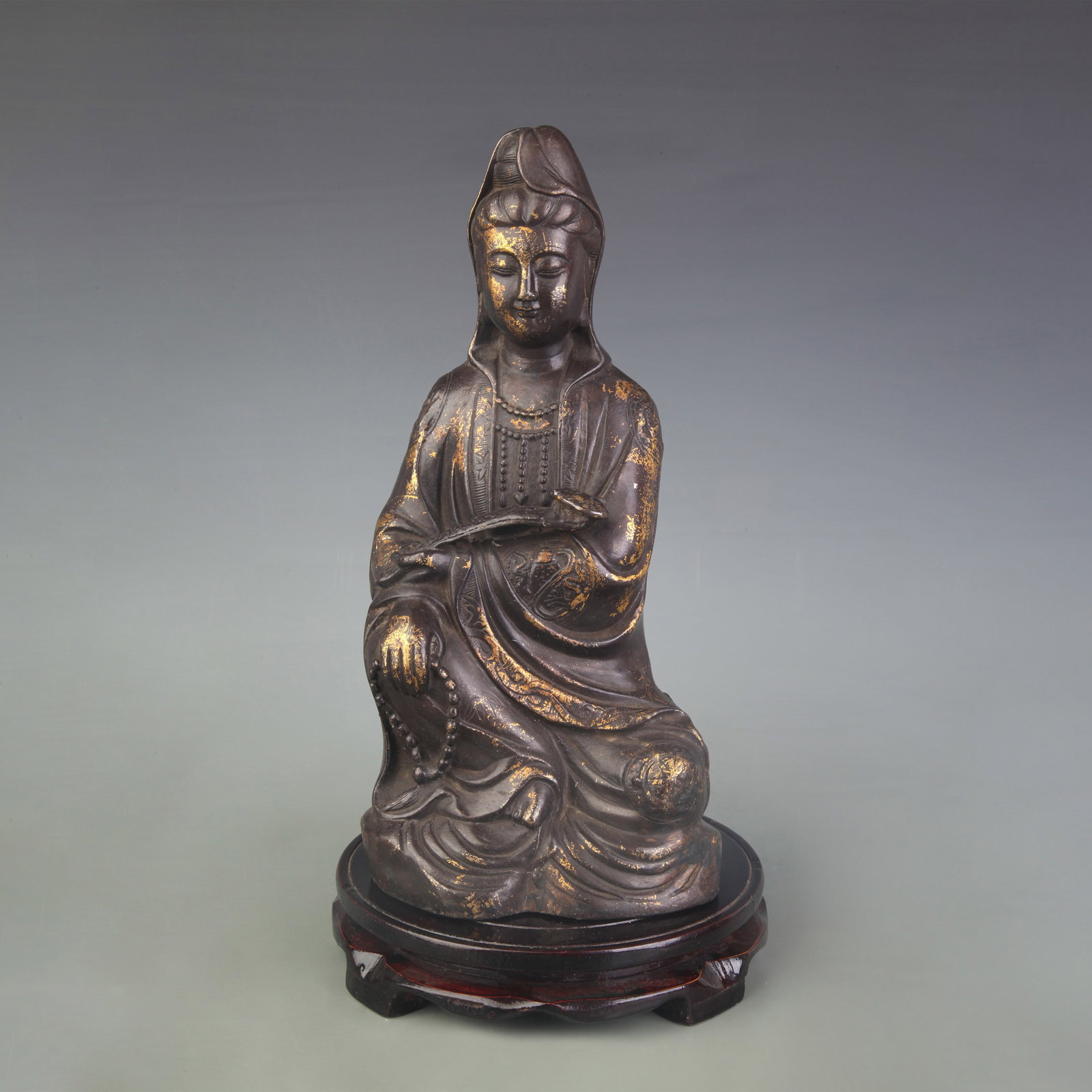 A FINE SEATED GUANYIN BRONZE STATUE: Qing Dynasty; High: 11.4 inch; Wooden base for picture and display only.