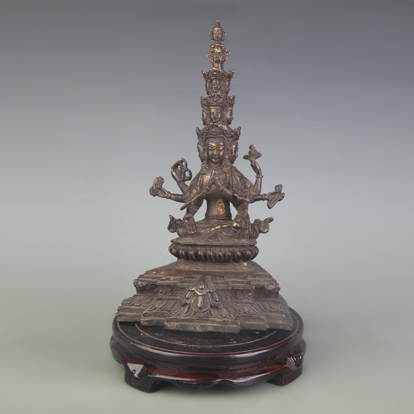 A TALL THOUSAND-FACED BUDDHA BRONZE FIGURE: 19th Century; High: 10.5 inch; Wooden base for picture and display only.