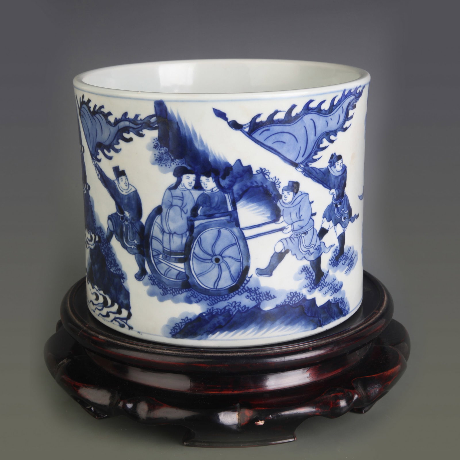 A BLUE AND WHITE BRUSH POT WITH FIGURAL DECORATION (1 of 5)
