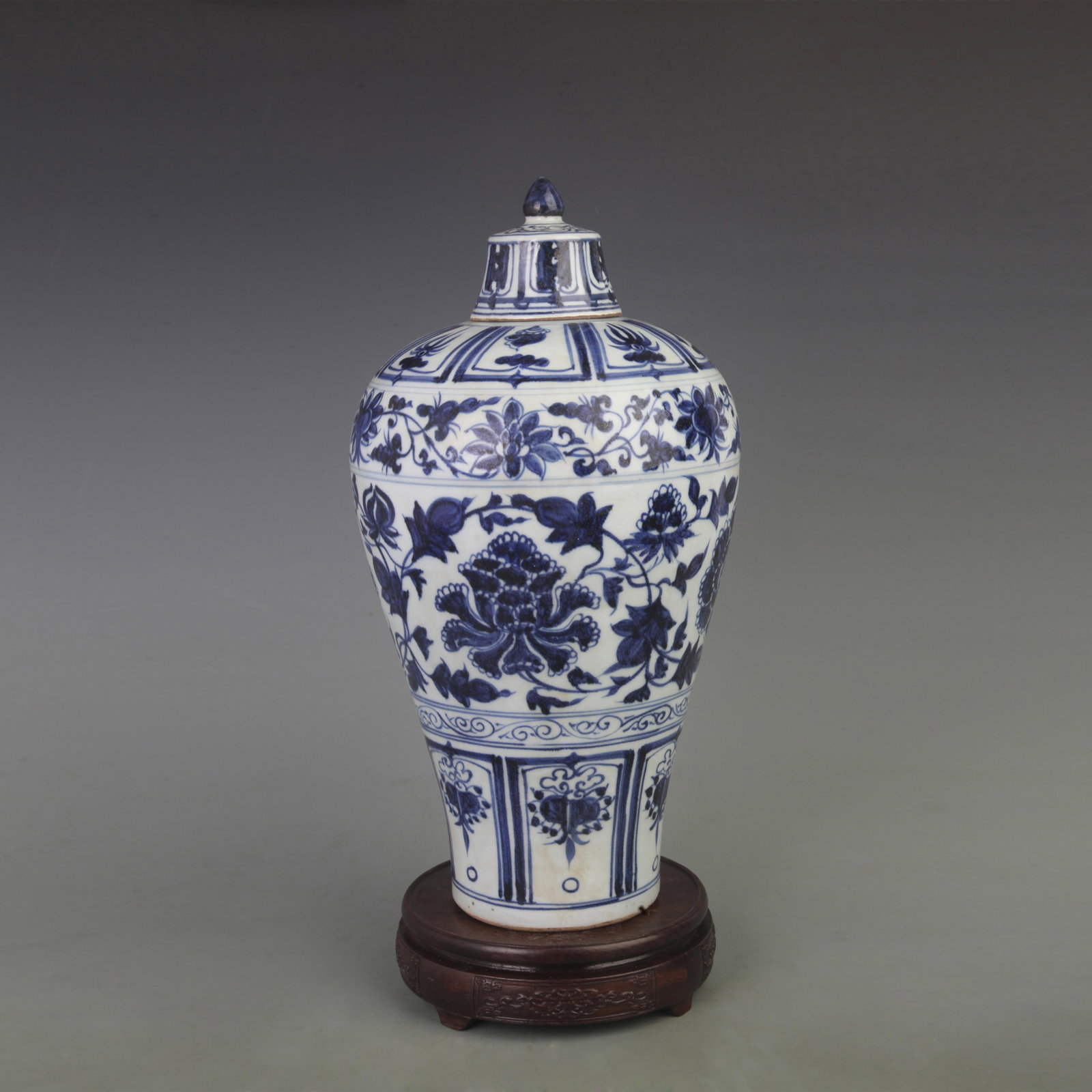 BLUE AND WHITE PLUM STYLE VASE WITH FLORAL PATTERNS: Ming Dynasty Style, Diameter: 7.4 inch; High: 14.5 inch. Wooden base for picture and display only.