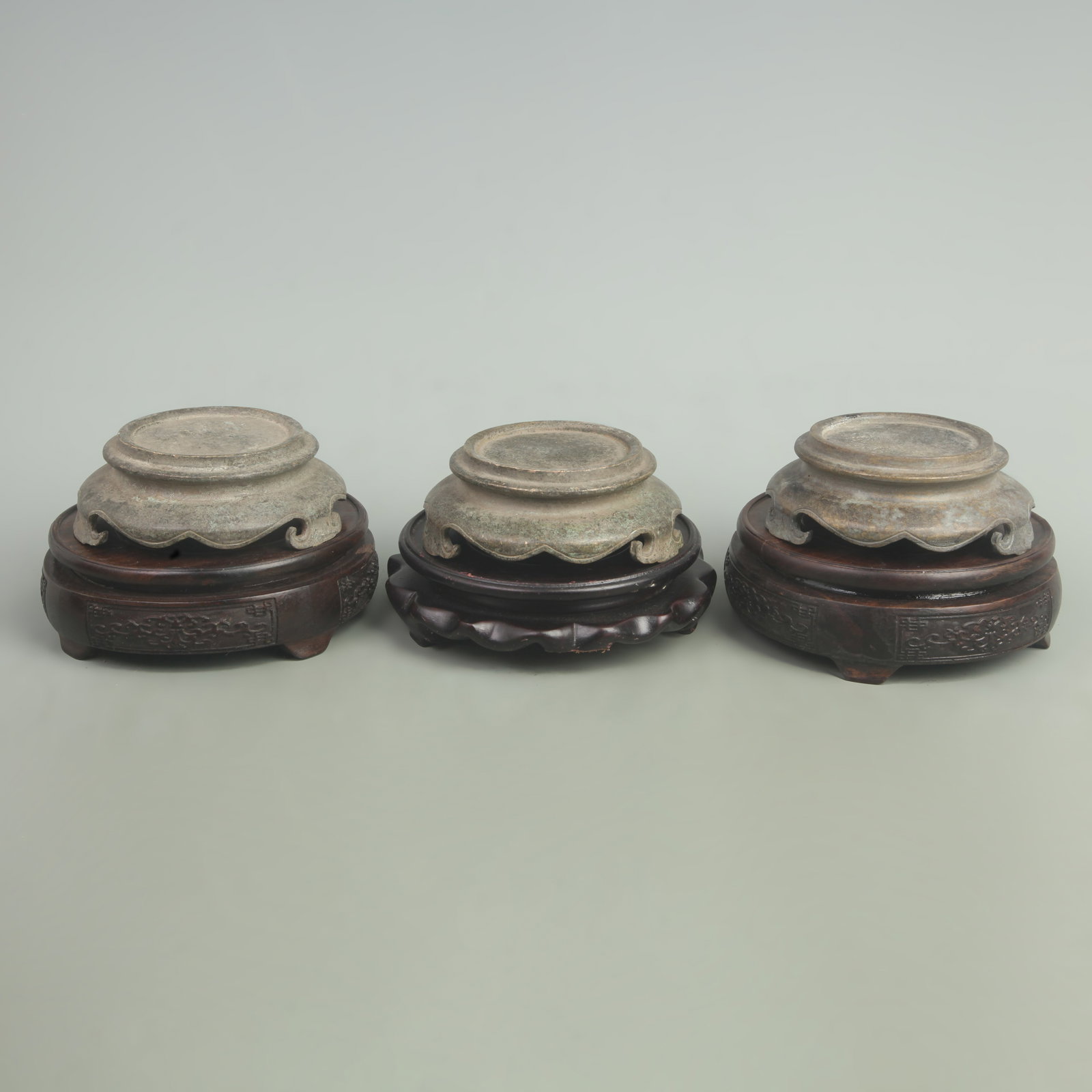 GROUP OF THREE BRONZE BASE: Qing Dynasty, High: 1.5 inch; High: 4.4 inch. Wooden base for picture and display only.