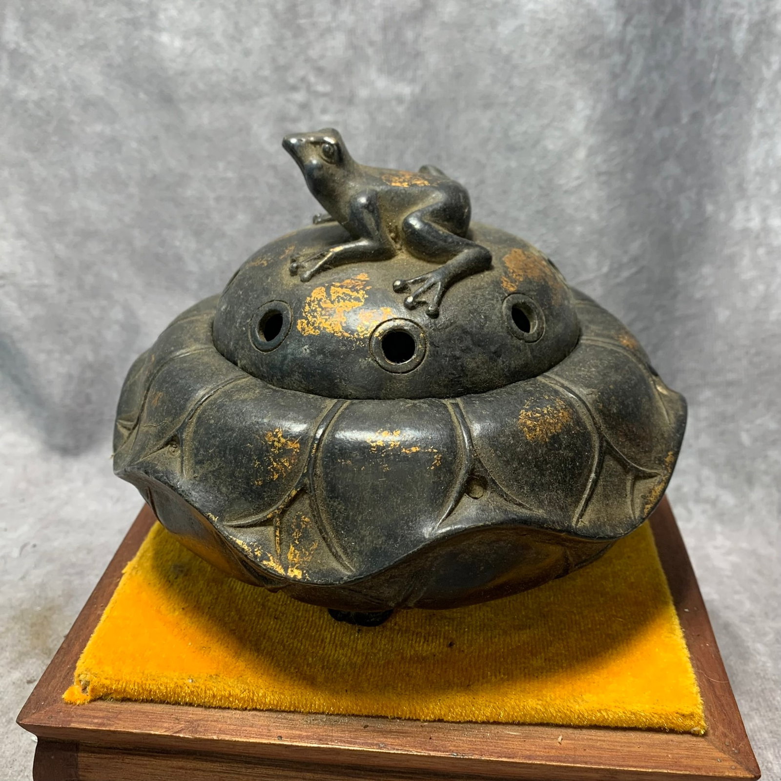 GILDED BRONZE FLORAL INCENSE BURNER: Ming Dynasty; High: 4.5 inch; Diameter: 5.5 inch; Wooden base for picture and display only.