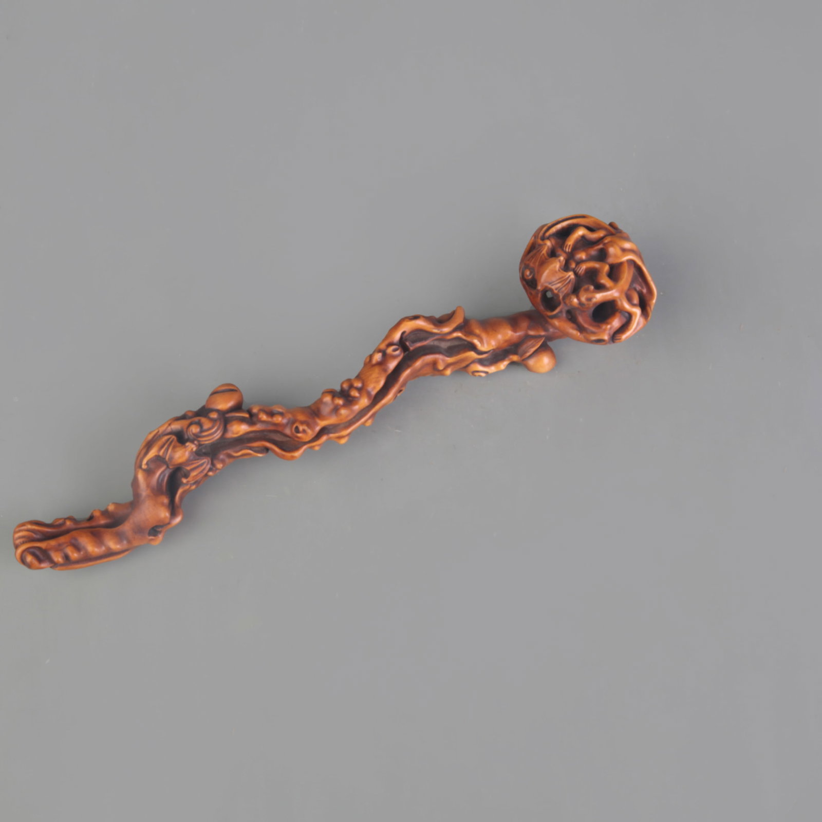 A FINE BOXWOOD MADE RU YI: Qing Dynasty; Long: 9.4 inch; Wooden base for picture and display only.