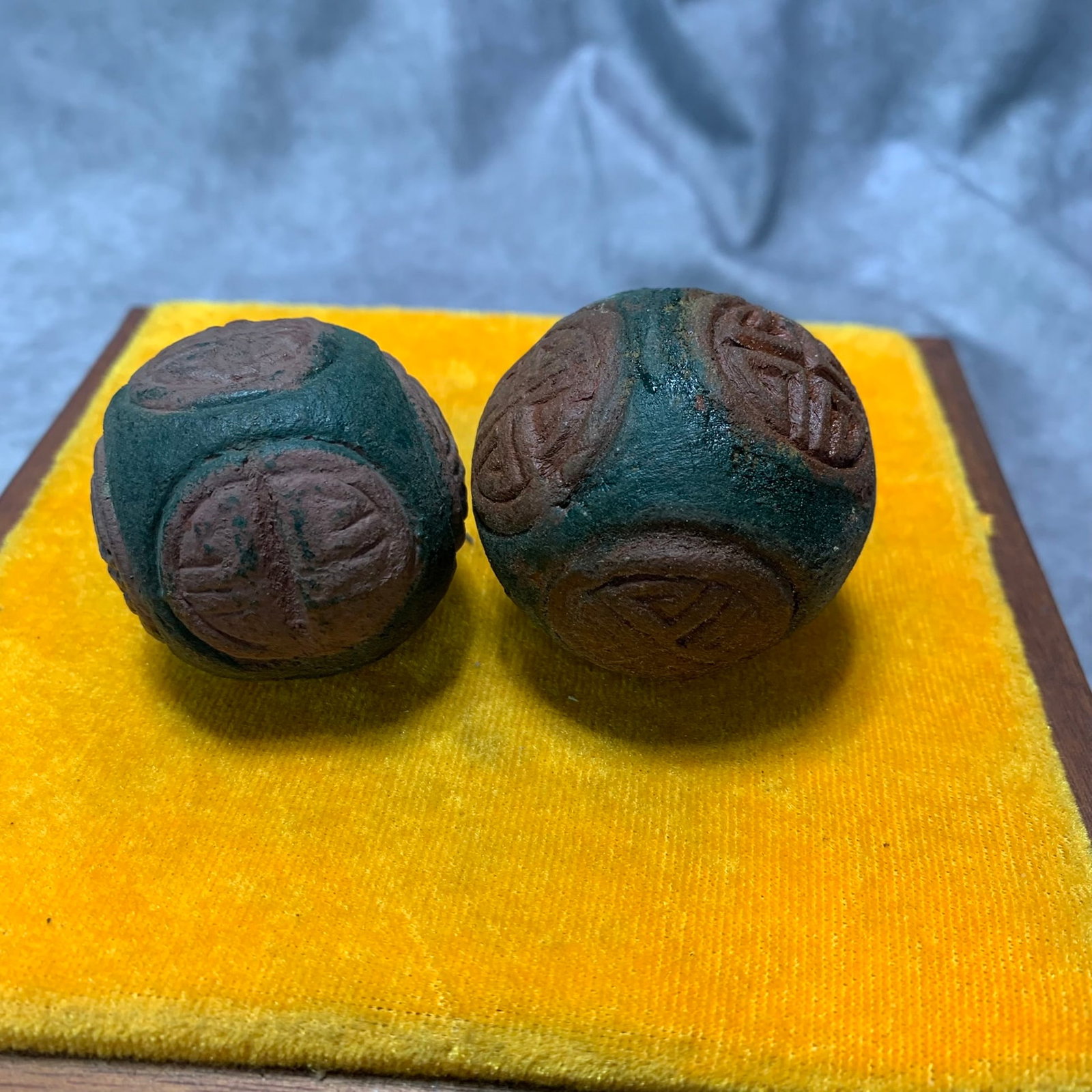 PAIR OF REPUBLIC PERIOD FRAGRANT WOOD HAND EXERCISE BALLS WITH ANIMAL MOTIF (1 of 3)