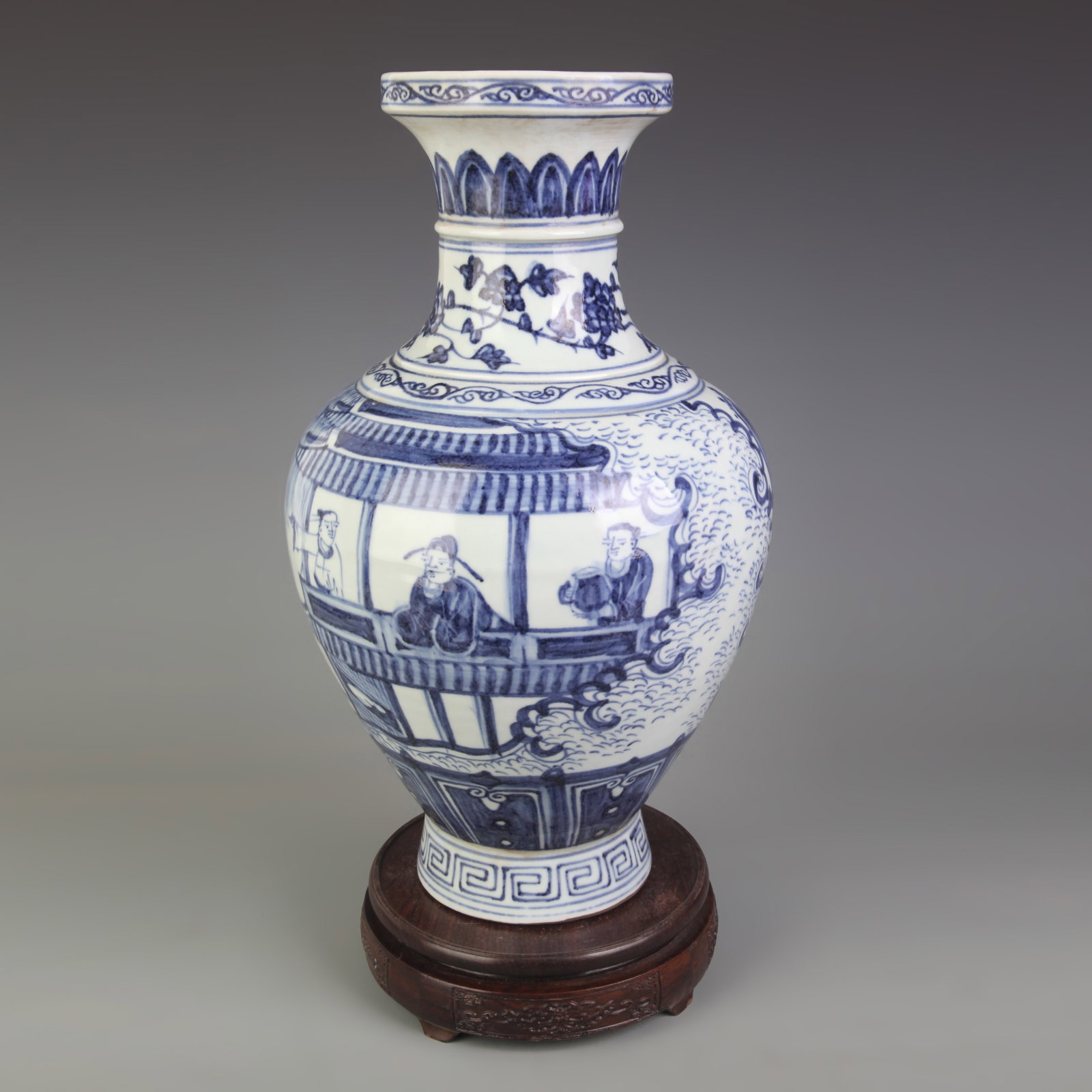 A BLUE AND WHITE PORCELAIN VASE WITH FIGURAL DECORATION: Ming Dynasty Style; High: 13.4 inch; Diameter: 8.0 inch; Wooden base for picture and display only.