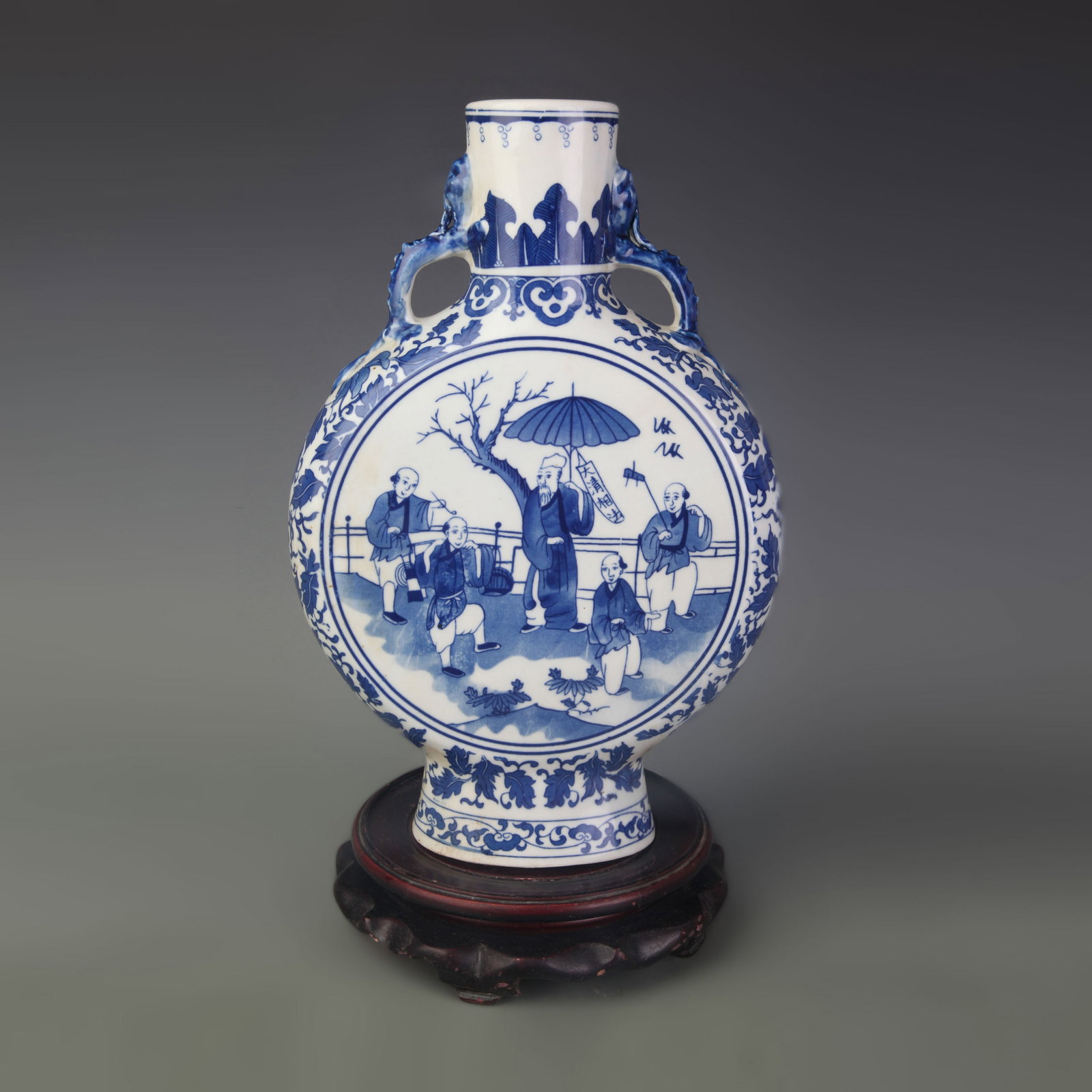 BLUE AND WHITE OPEN SCENE FIGURE PATTERN MOON FLASK: Qing Dynasty Qian Long Period; Width: 8.1 inch; High: 12.5 inch; Wooden base for picture and display only.