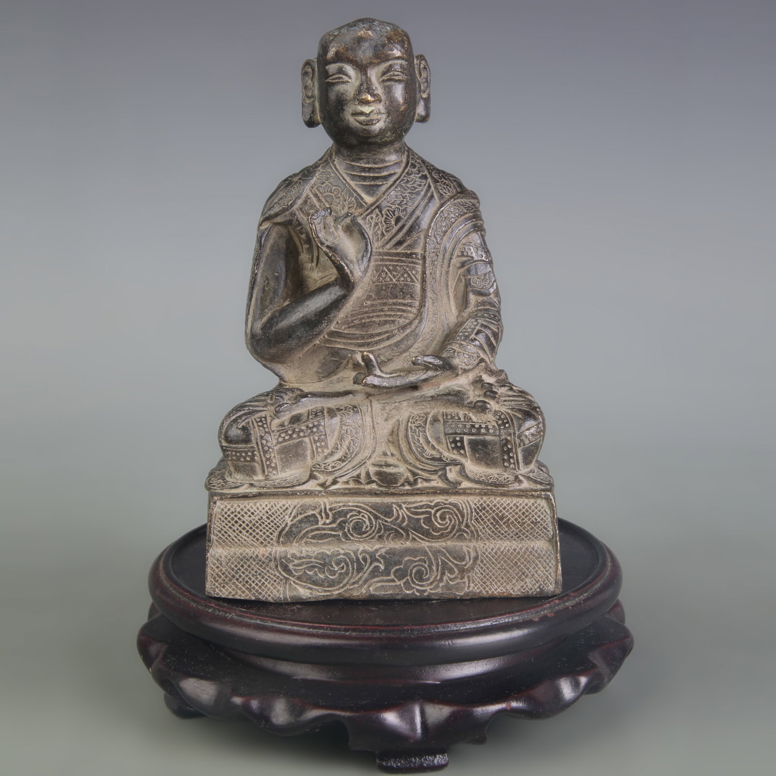 A FINE BRONZE LAMA STATUE BUDDHIST MASTER: Song Dynasty Style; Width: 3.5 inch; High:5.5 inch; Wooden base for picture and display only.