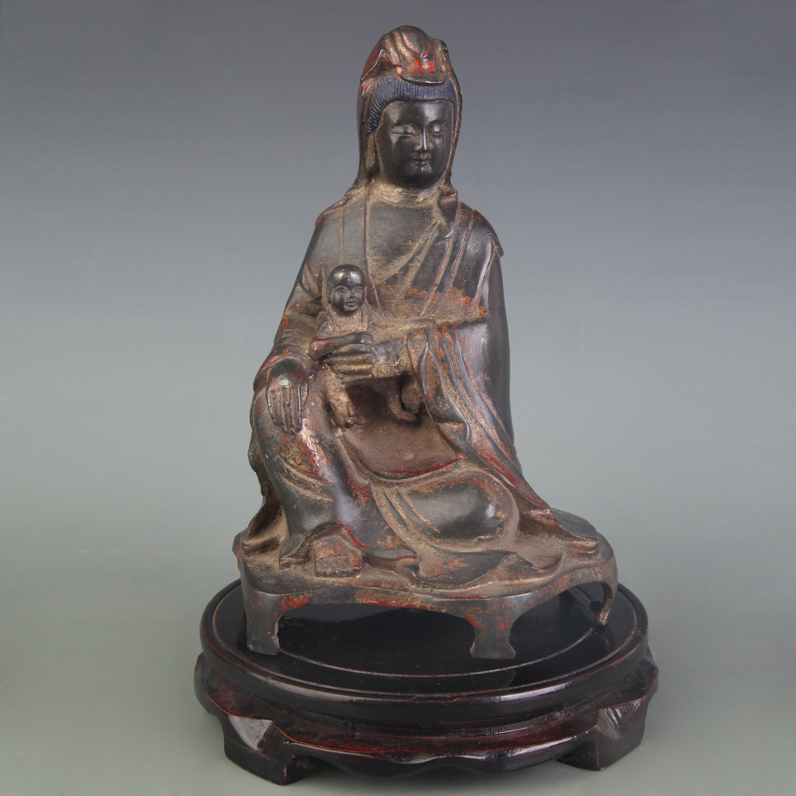 A FINE BRONZE FIGURE OF SONGZI GUANYIN "CHILD-GIVING GUANYIN": Qing Dynasty; Width: 5.5 inch; High: 8.8 inch; Wooden base for picture and display only.