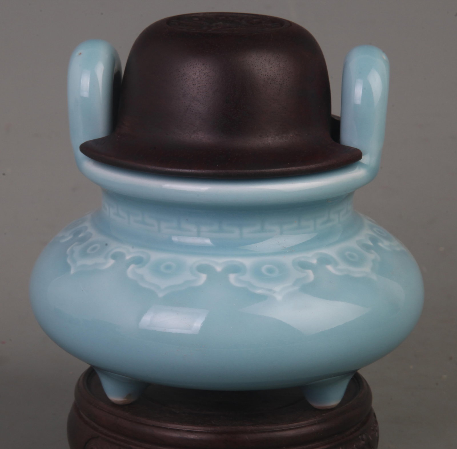 SKY BLUE GLAZED TRIPOD CENSER WITH UPRIGHT HANDLES AND HARDWOOD COVER: Song Dynasty Style; Diameter: 4.4 inch; High: 4.6 inch; Wooden base for picture and display only.