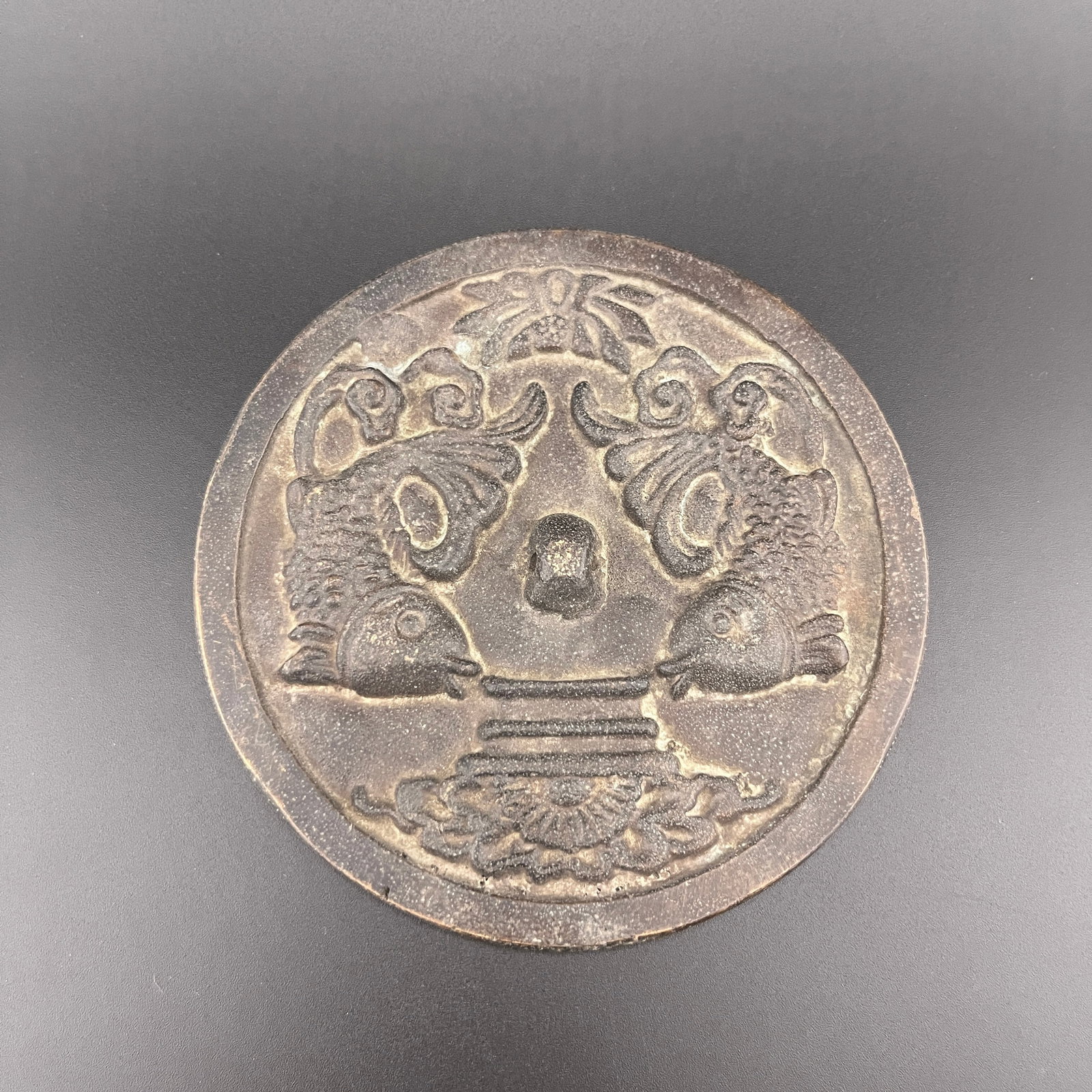 A FINE TWIN FISH CHINESE BRONZE MIRROR (1 of 4)