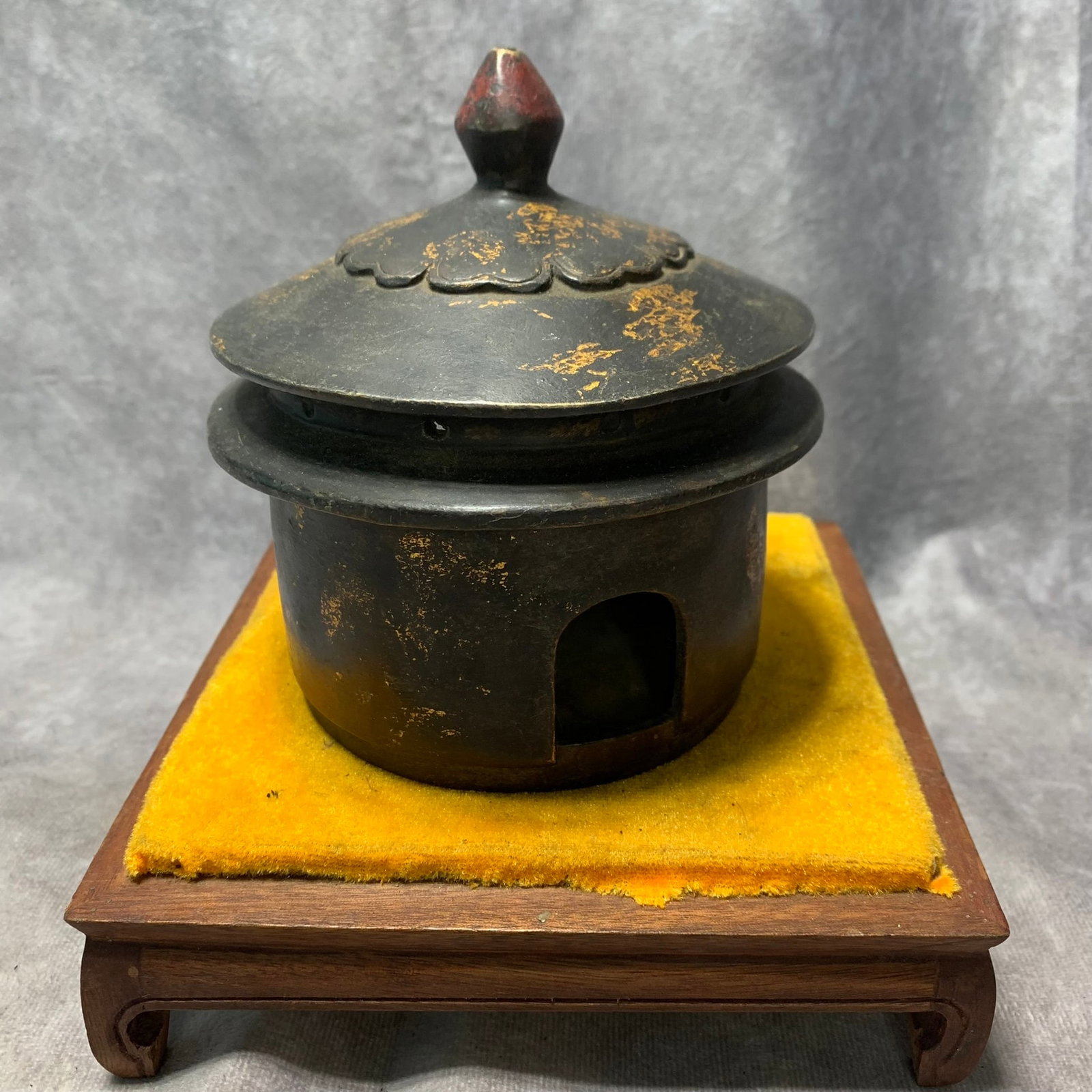GILT BRONZE THREE-LEGGED INCENSE BURNER WITH BAMBOO JOINT PATTERNS: Ming Dynasty; High: 4.5 inch; Diameter: 4.9 inch. Wooden base for picture and display only.