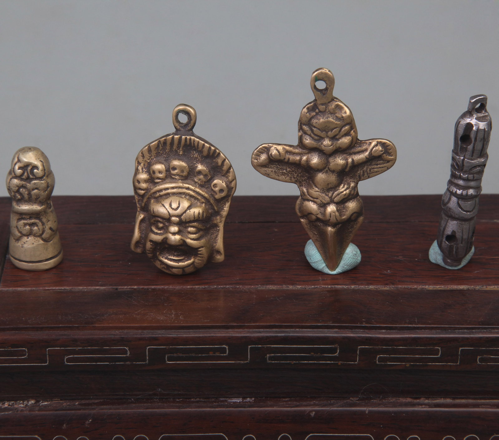 GROUP OF FOUR TIBETAN BUDDHISM INSTRUMENTS PHURBA: Qing Dynasty, Long: 2.2 to 1.5 inch. Wooden base for picture and display only.
