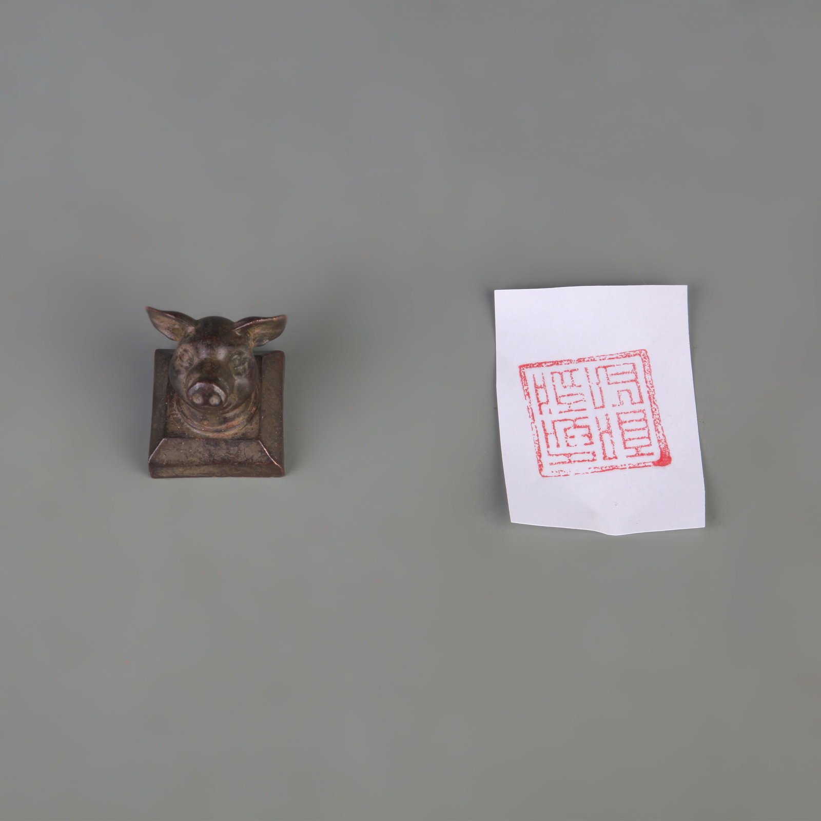 BRONZE SQUARE ZODIAC SEAL (PIG): Qing Dynasty, Width: 1.3 inch; High: 1.5 inch; Wooden base for picture and display only.