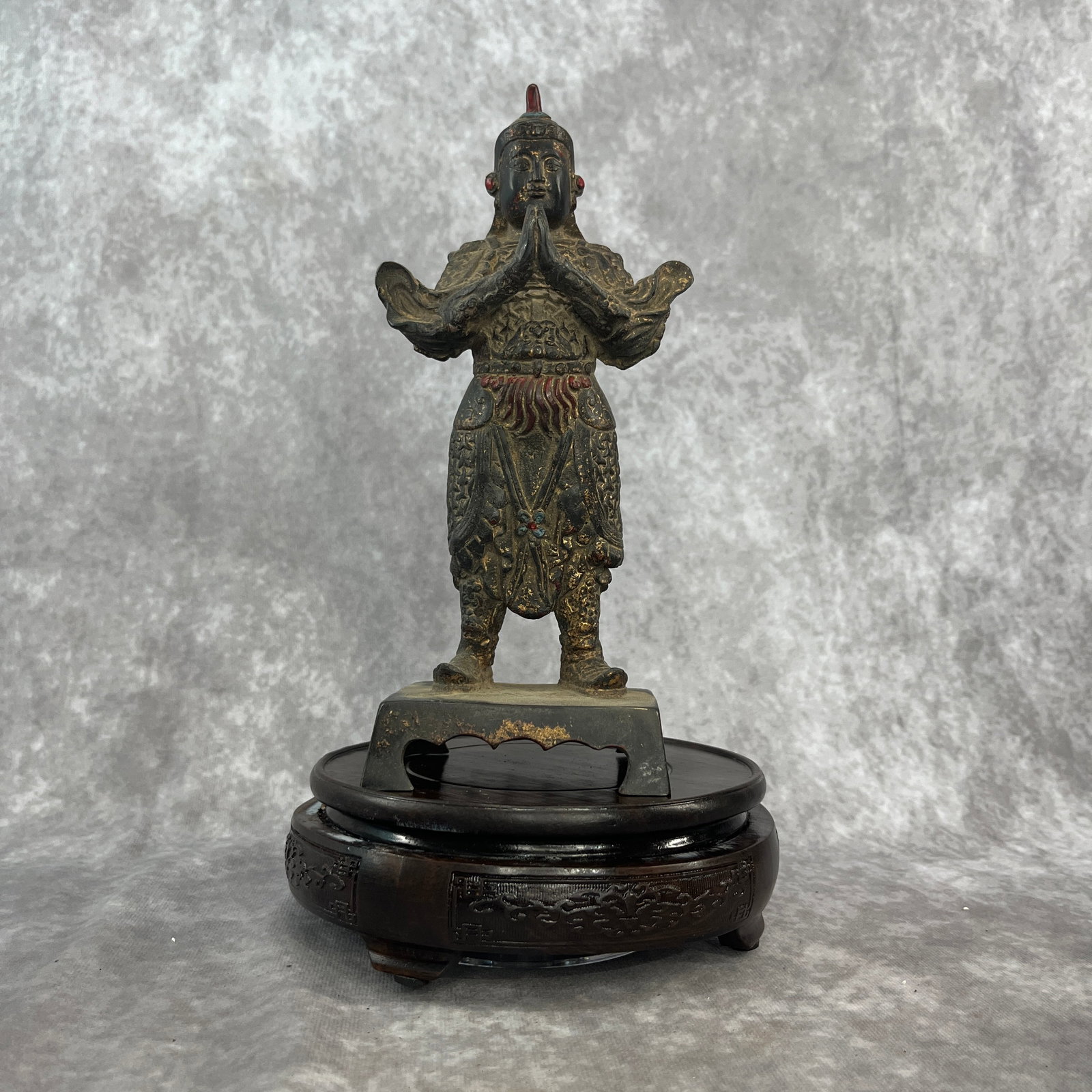 A FINE BRONZE FIGURE OF GUAN GONG, GOD OF WAR: Qing Dynasty; Long: 3.7 inch; Width: 2.9 inch; High: 9.2 inch. Wooden base for picture and display only.
