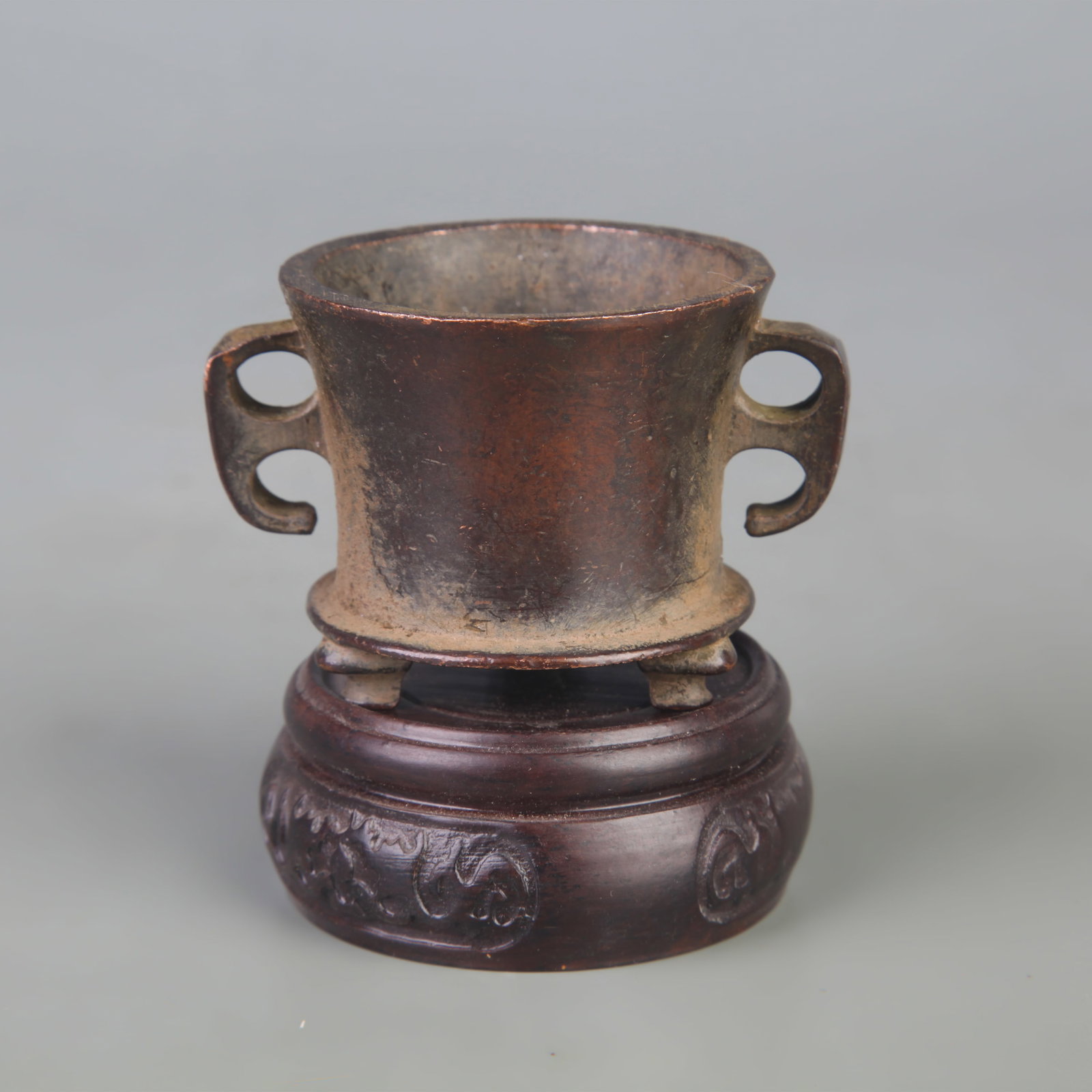 SMALL TWIN-EAR, TRIPOD BRONZE INCENSE BURNER: Qing Dynasty; Width: 2.6 inch; High: 1.8 inch; Wooden base for picture and display only.