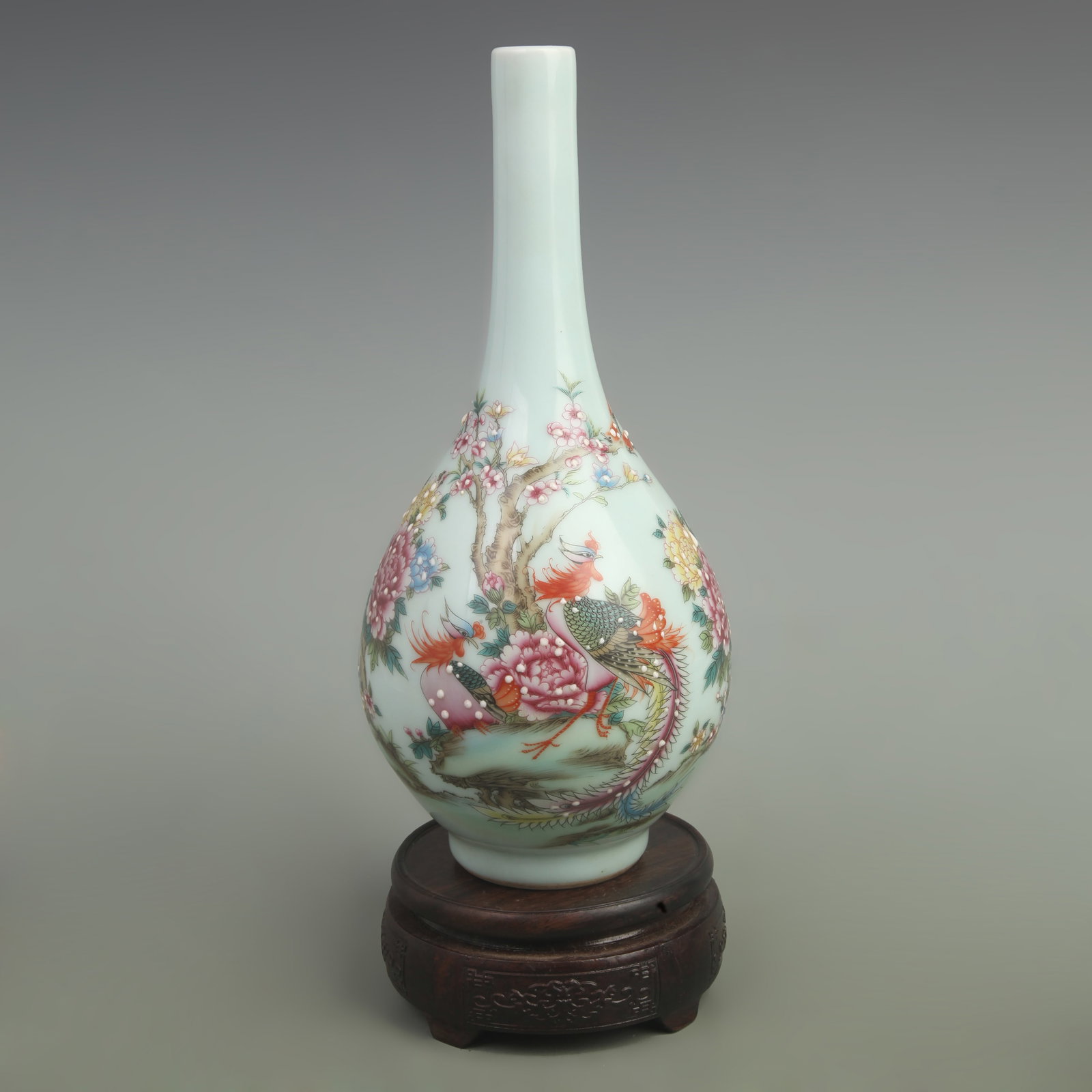 FAMILLE-ROSE LIGHT CELADON-GROUND GALLBLADDER STYLE PORCELAIN VASE: Qing Dynasty Qian Long Period; High: 11 inch; Width: 5.5 inch. Wooden base for picture and display only.