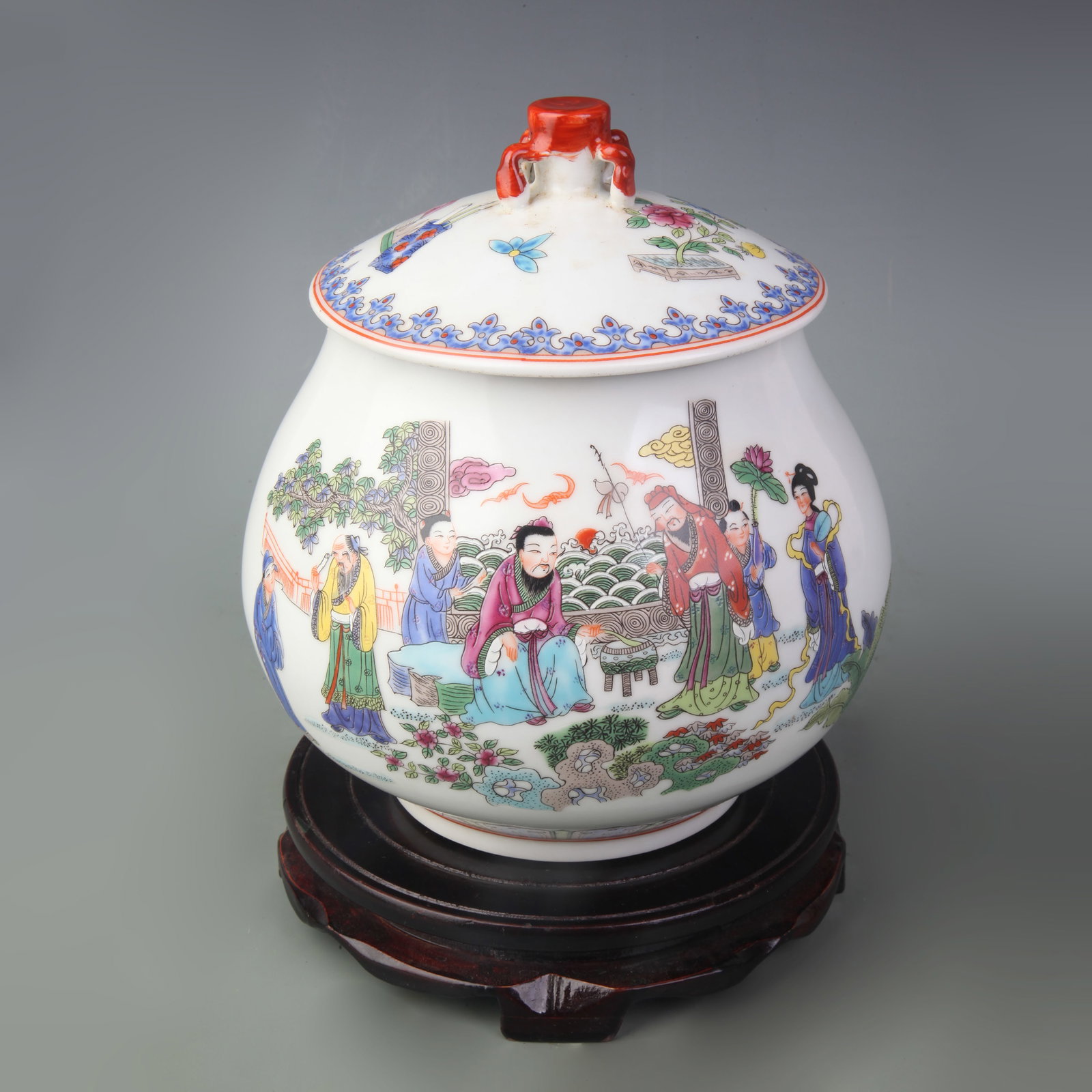 A FAMILLE ROSE JAR WITH FIGURAL DECORATION: 20th Century; Diameter: 5.1 inch; High: 8.0 inch; Wooden base for picture and display only.