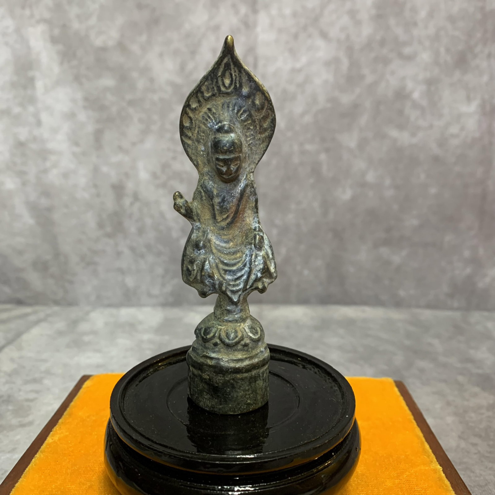 A FINE SMALL BRONZE TIBETIAN STANDING BUDDHA STATUE: Northern Wei Style; High: 4.3 inch; Width: 1.0 inch; Wooden base for picture and display only.